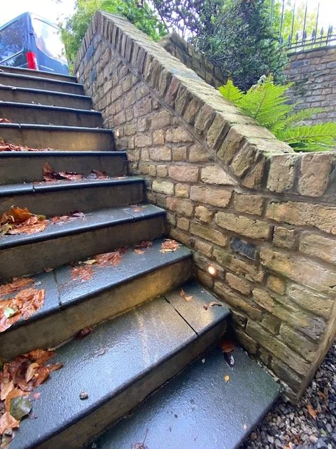 Hunza copper wall-mounted spotlight, ELV garden lighting installation Hampstead — Hobbs Electrical Group