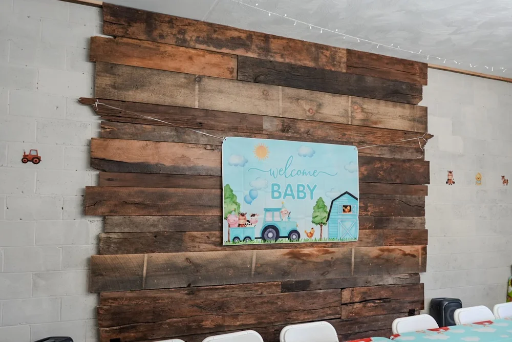 Welcome Baby banner and farm decorations