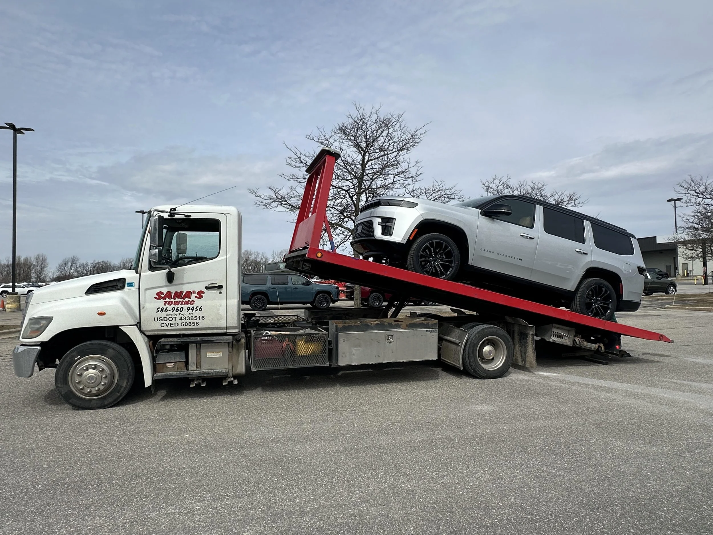 Jeep Grand Wagoneer towed by Sana's Towing