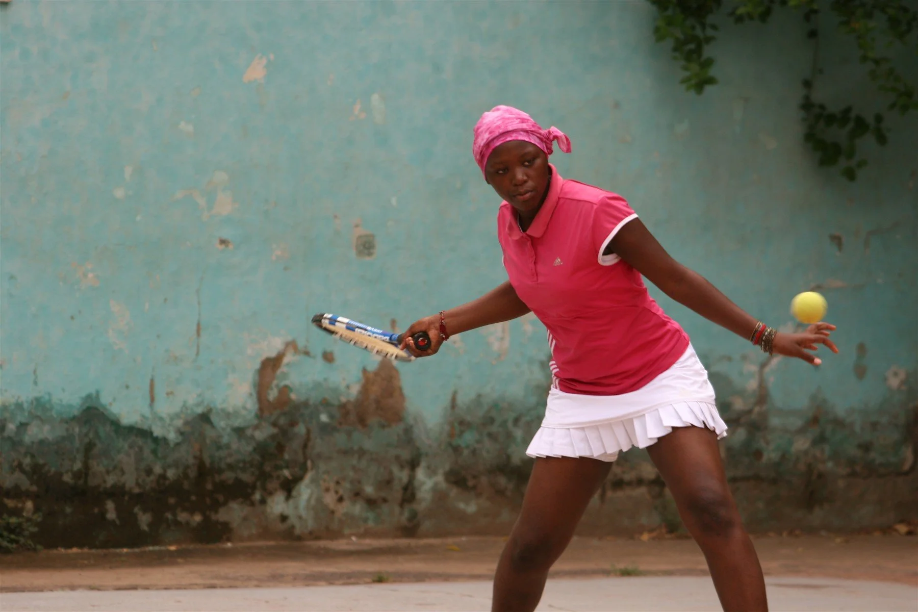 A young player taking part in tennis activities in Mali