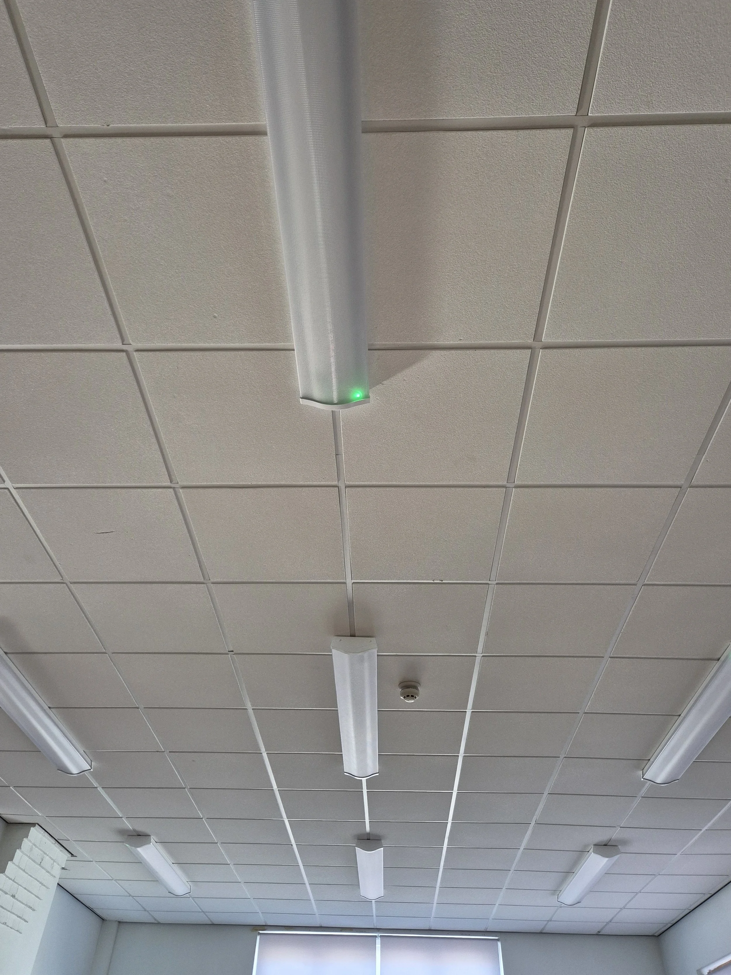 Fluorescent ceiling lighting assessed for LED replacement during a Salvis energy audit