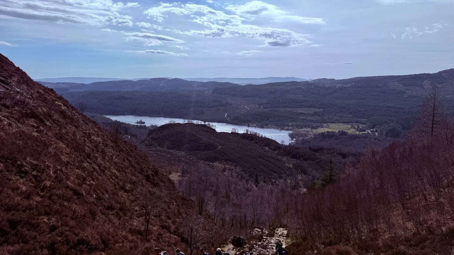 Loch Achray and wooded slopes seen from the path on Ben A’an.