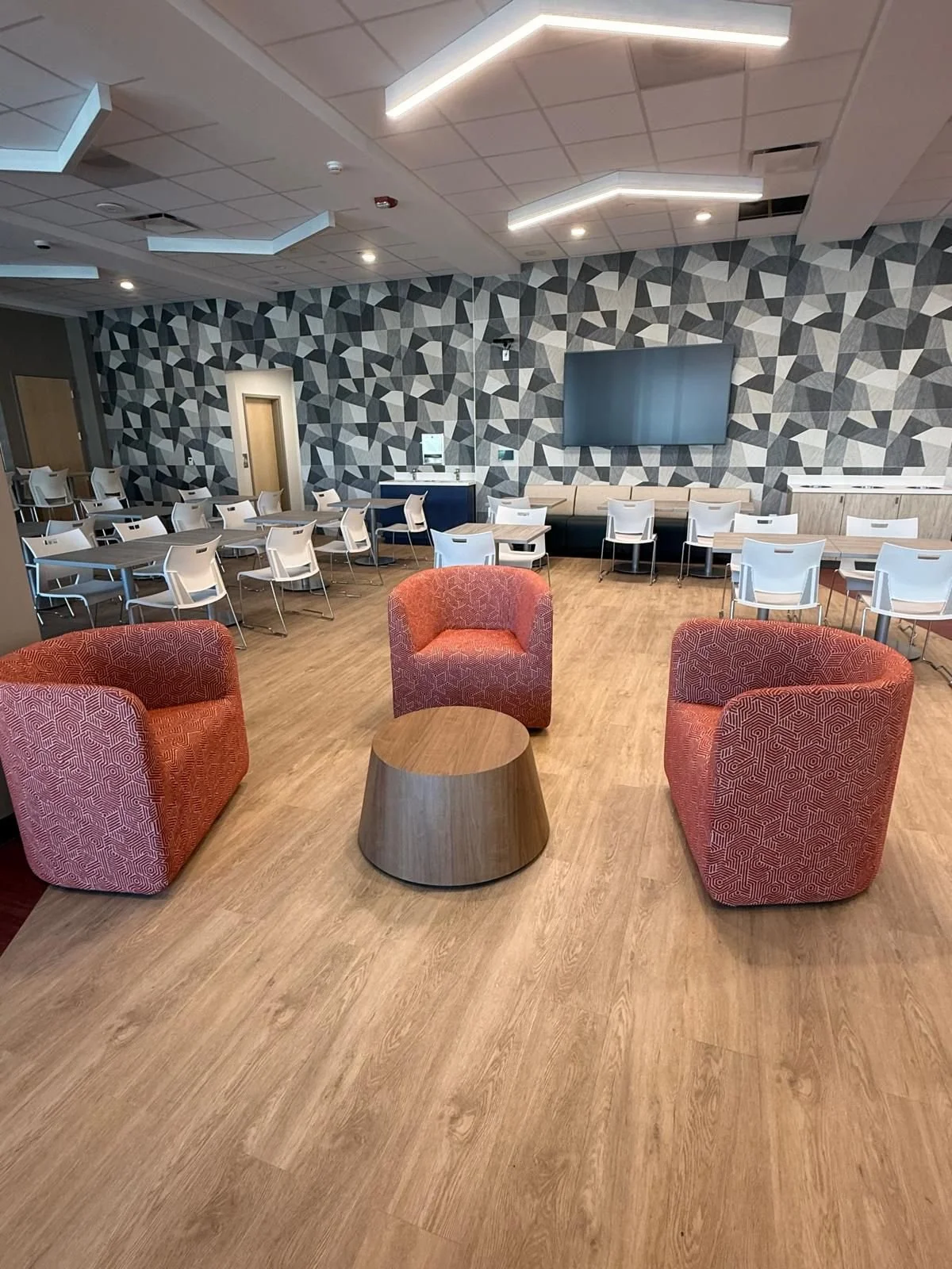University lounge with soft seating, study tables and chairs installed by USSI