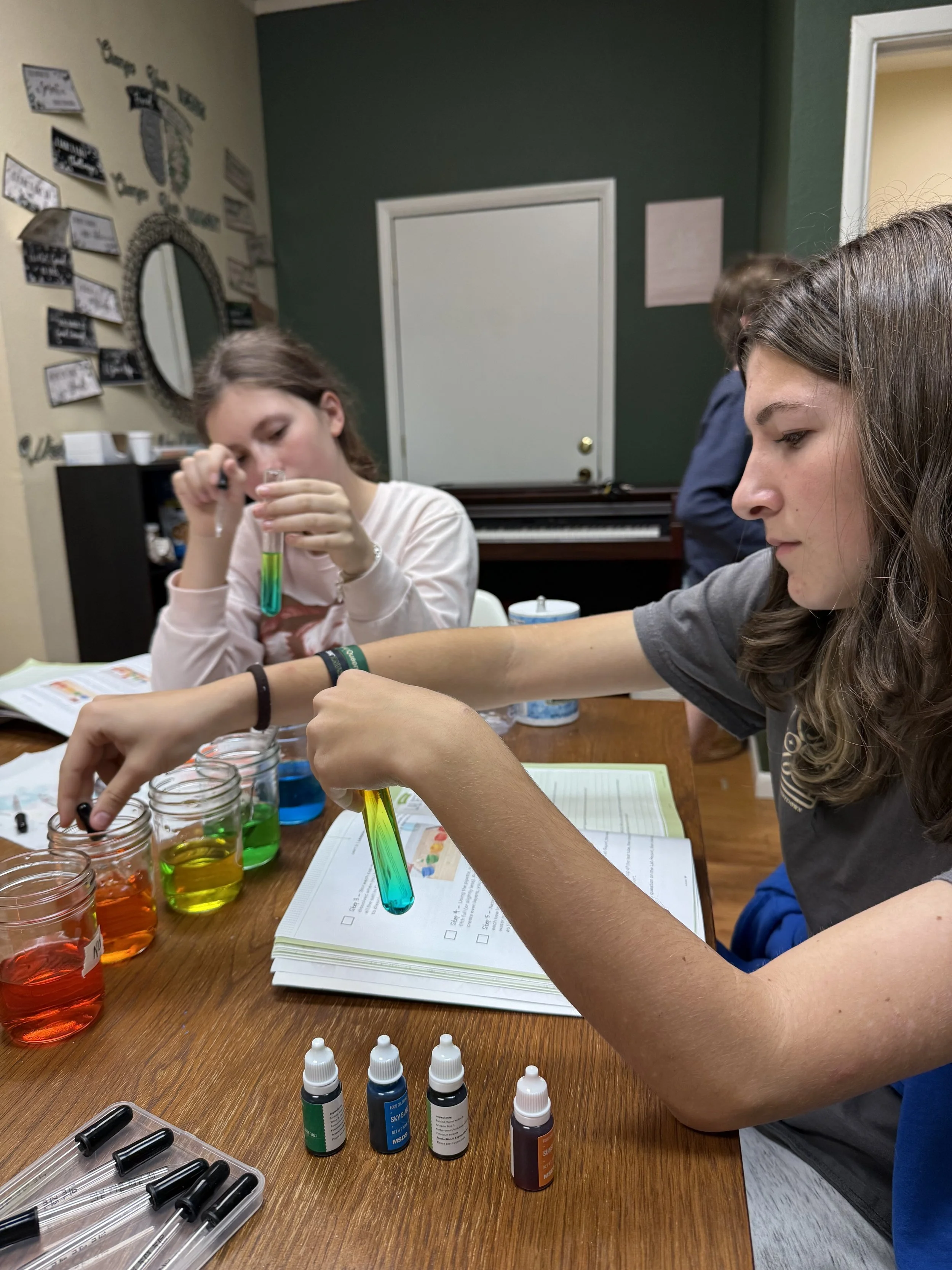 Science experiment with colorful liquids