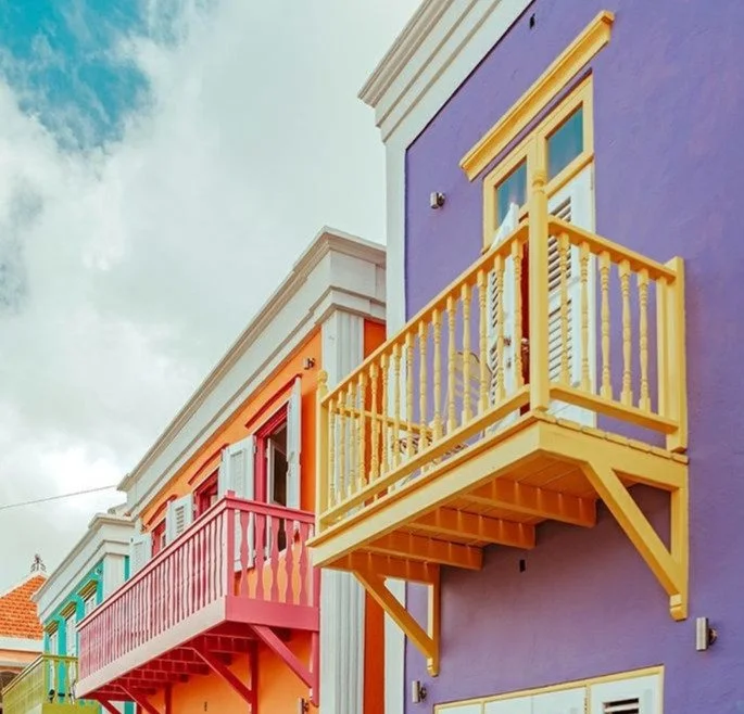 Colorful Curaçao architecture representing local property expertise