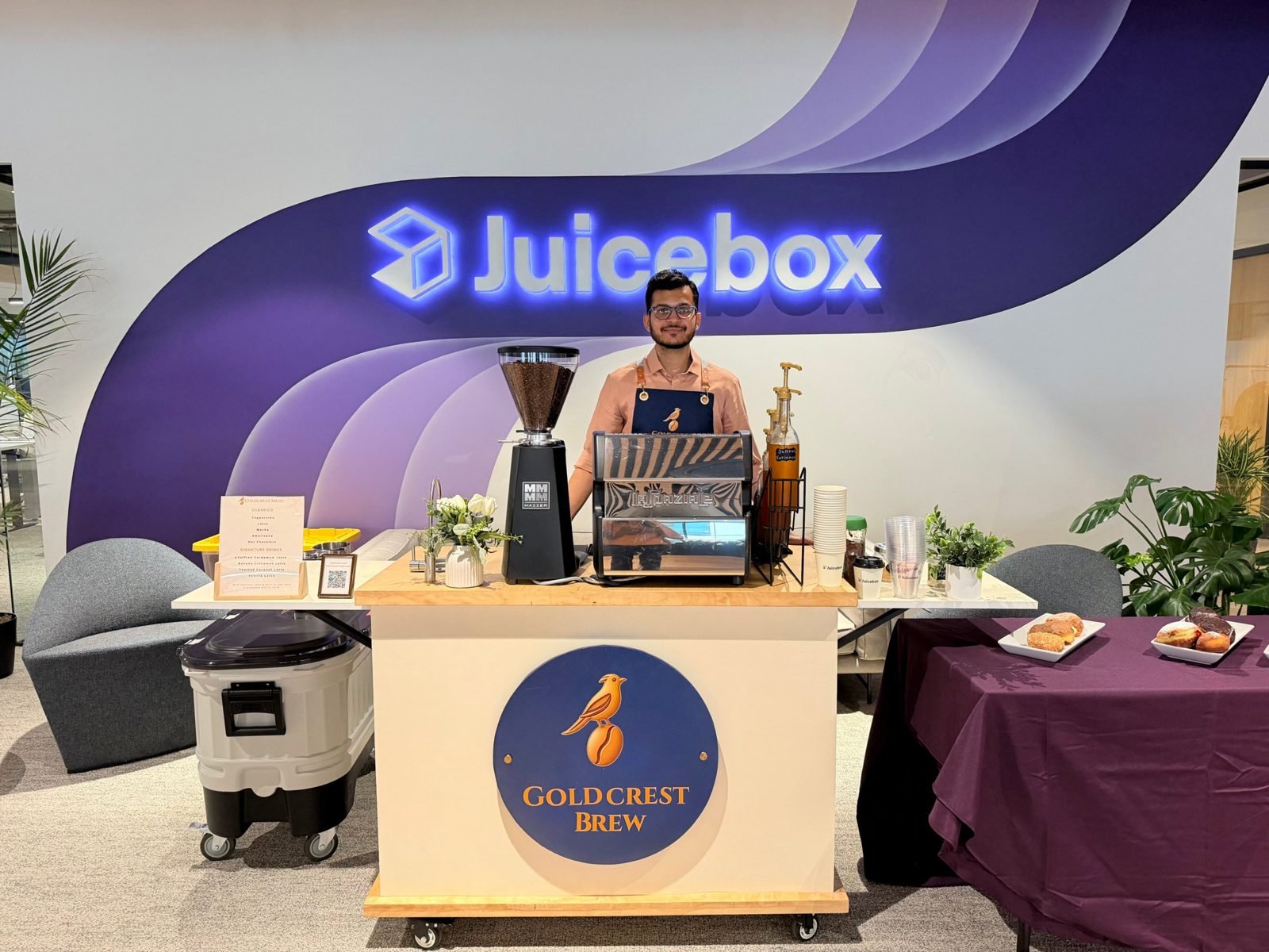Goldcrest Brew founder Zain at the coffee cart during a corporate event at Juicebox headquarters in San Francisco