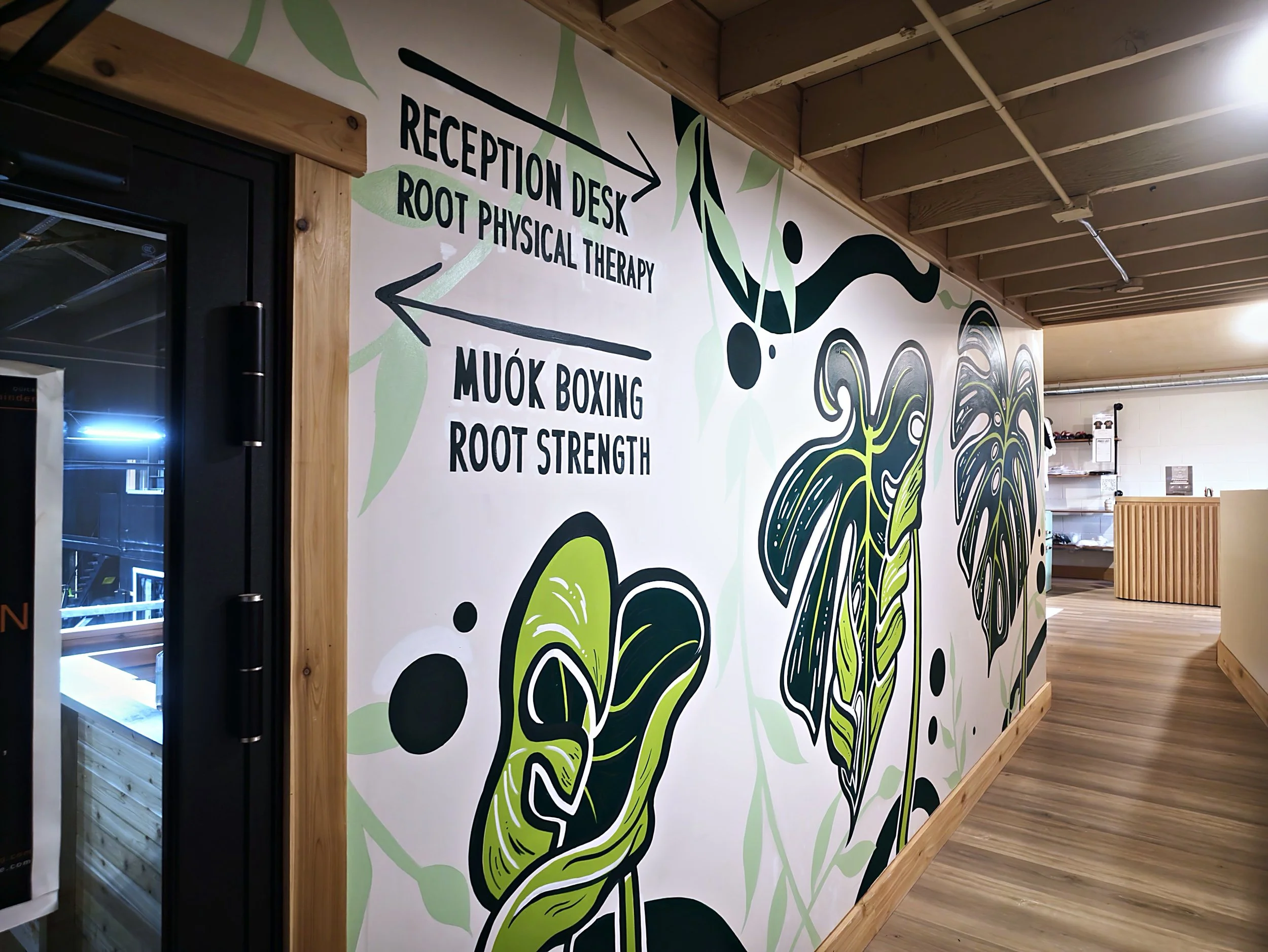 Colorful hallway mural inside Root Physical Therapy and Root Strength in Georgetown Seattle