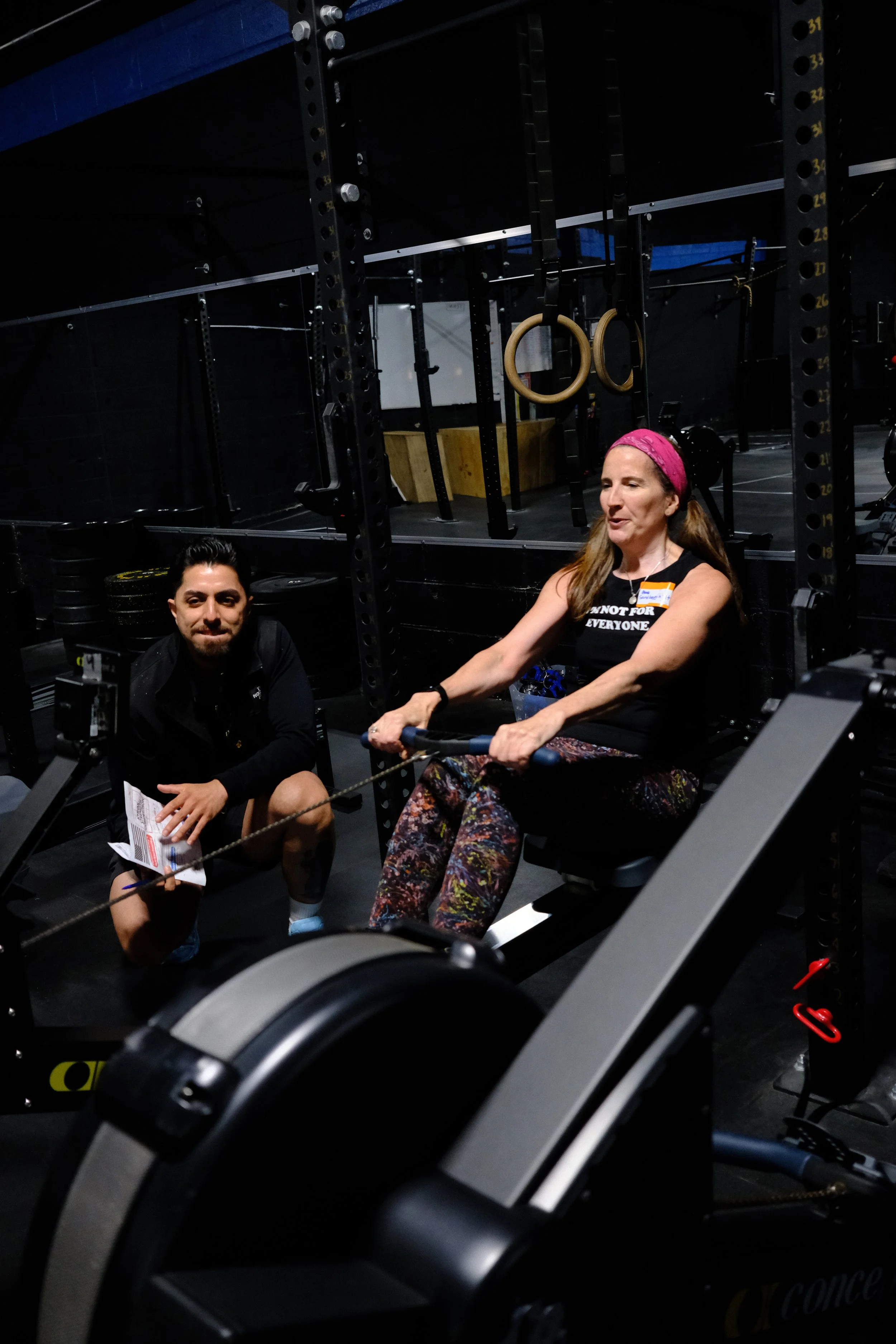 Rehabilitation Strength Specialist working alongside physical therapist during Bridge session at Root Strength Georgetown Seattle