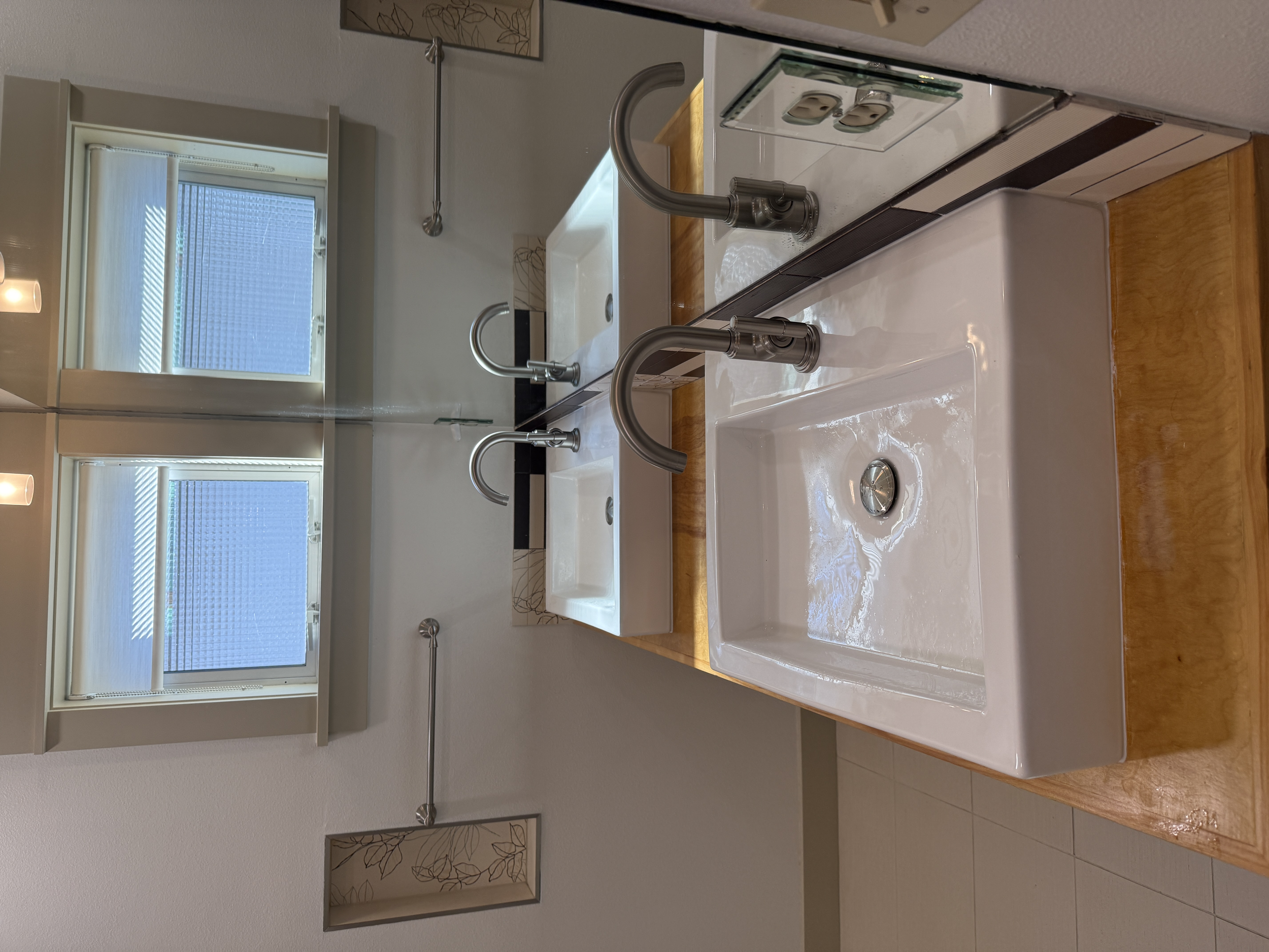 New lavatory sink and faucet installation in Burien, WA by Neptune Plumbing for a bathroom fixture upgrade.