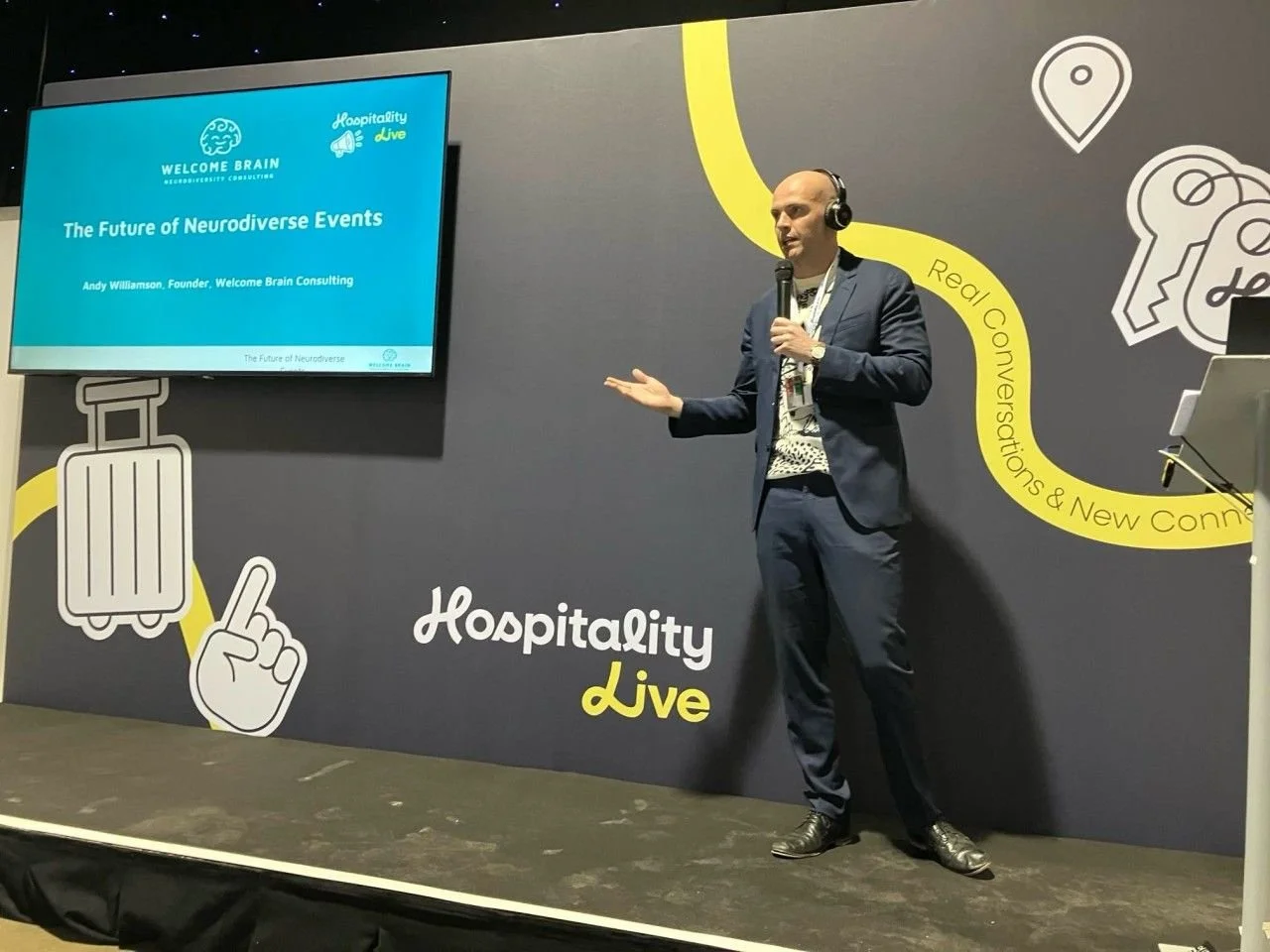 Andy speaking at an event