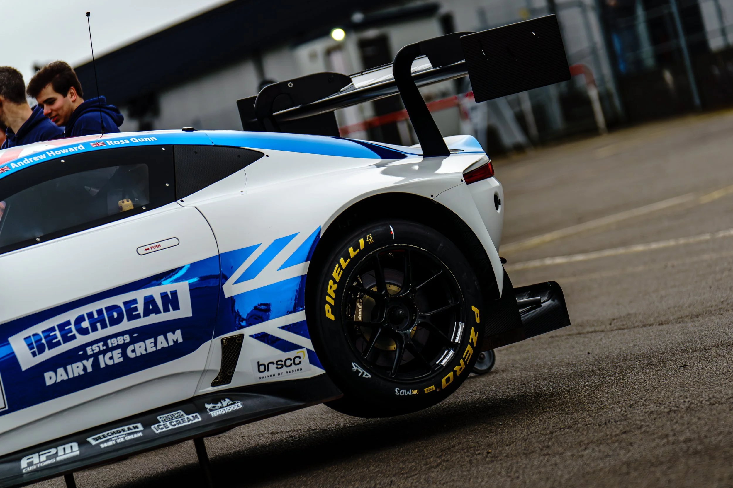 Race car displaying team and sponsor branding