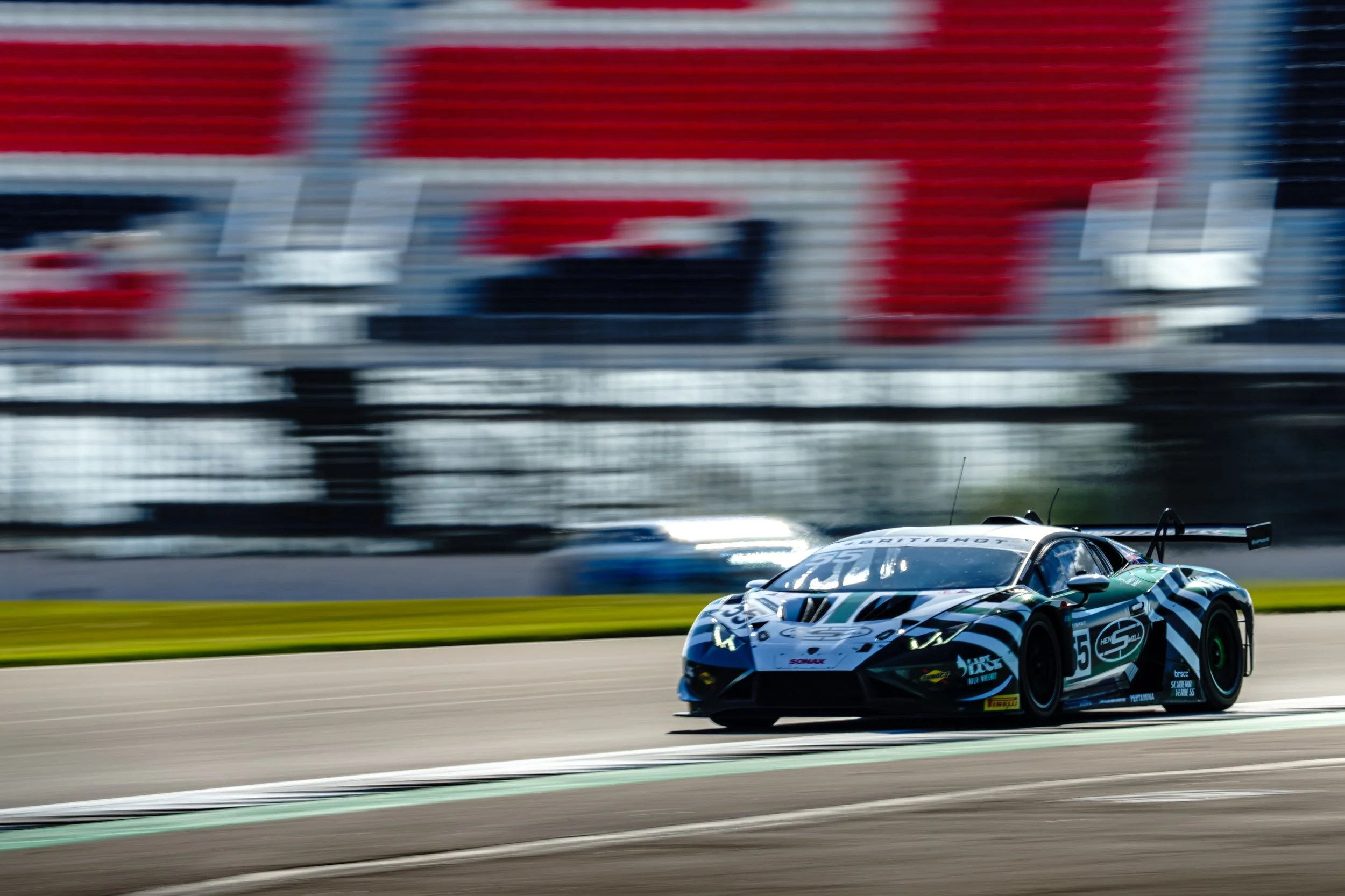 Lamborghini race car captured in a high-speed panning shot