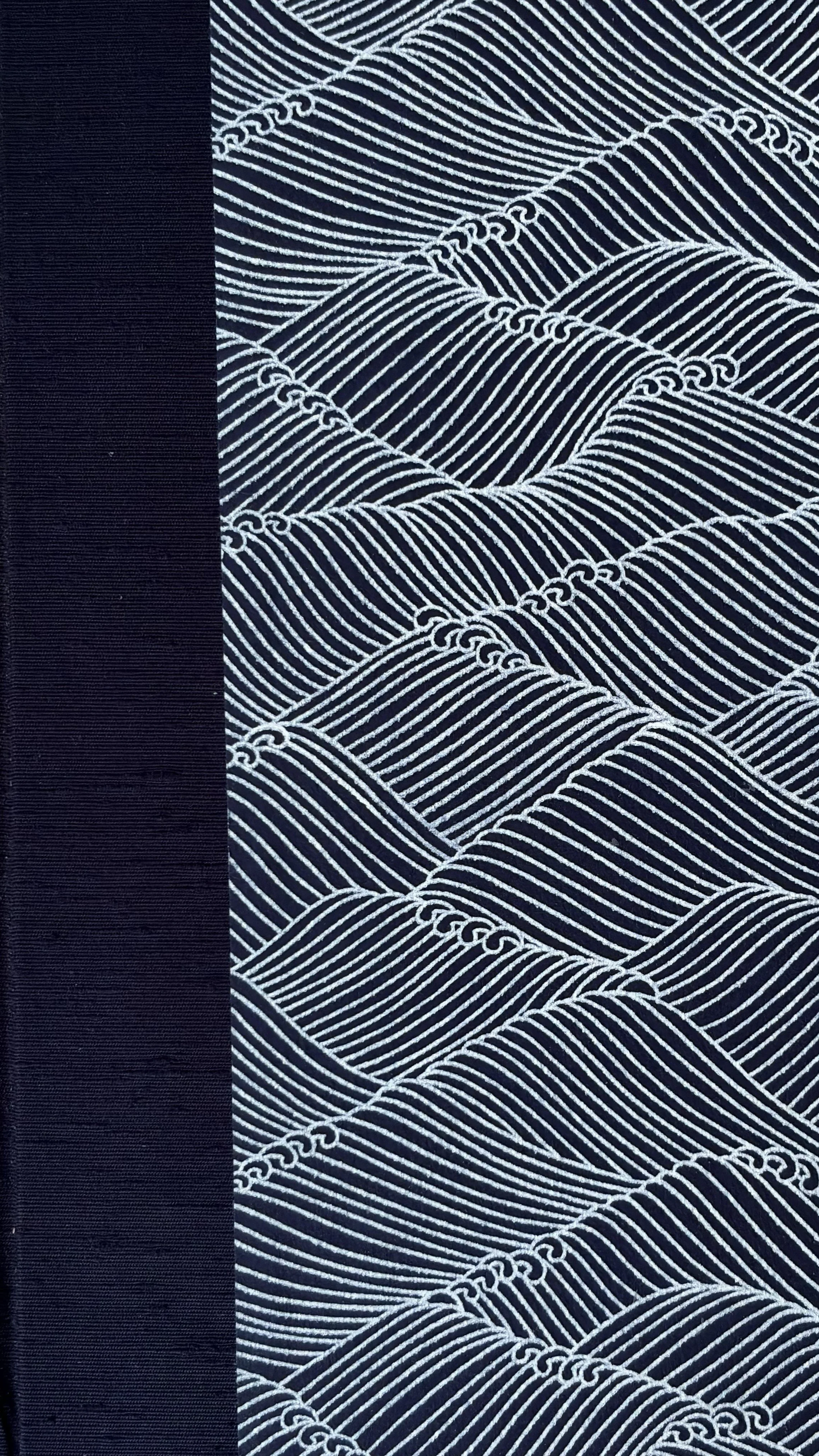 Lettered edition close-up showing Navy Asahi cloth and Aitoh Blue Wave paper