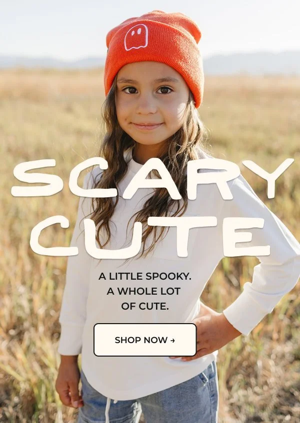 Scary Cute Halloween email with a kid in an orange ghost beanie.