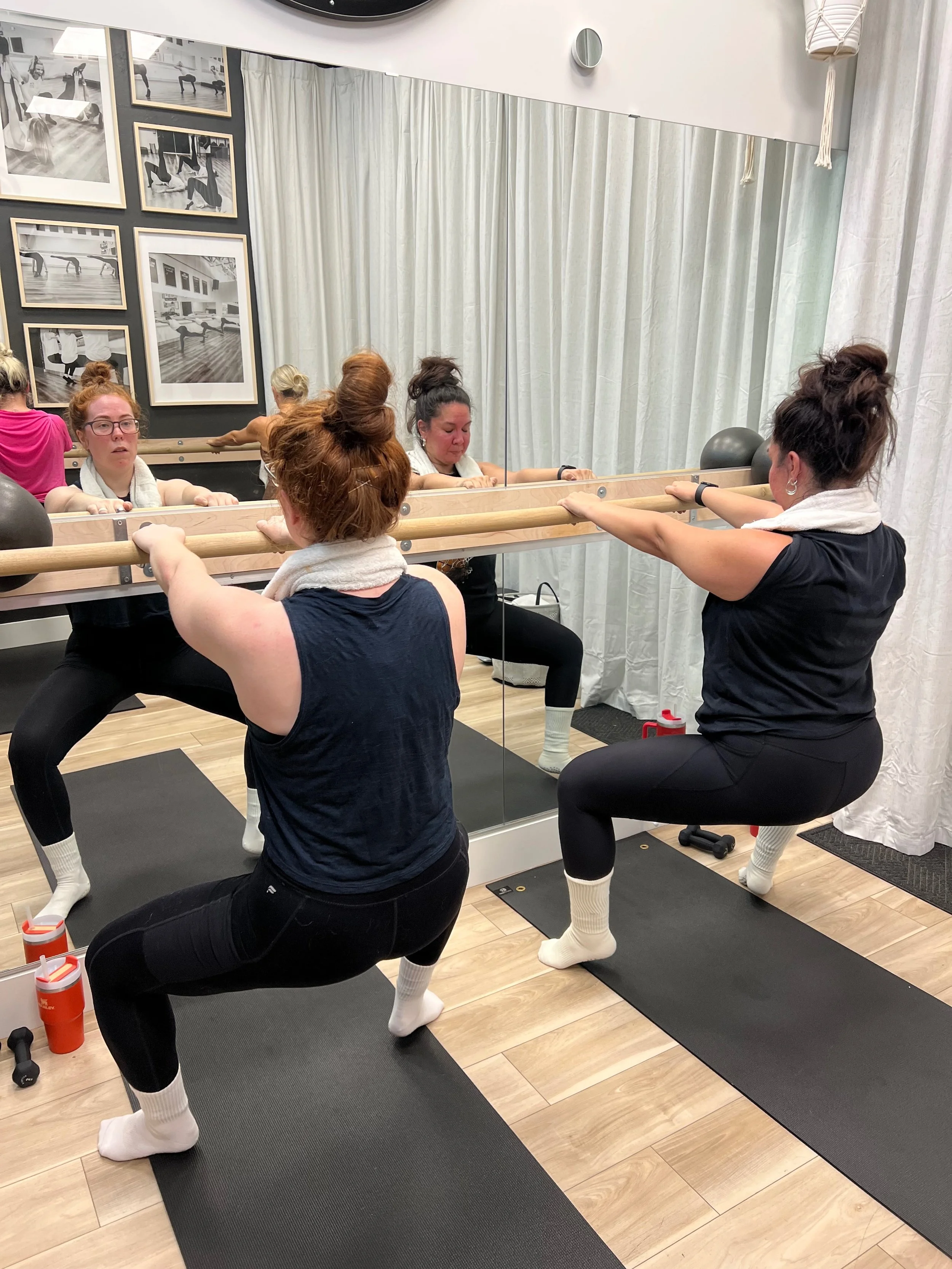 Club eNRG clients at the barre