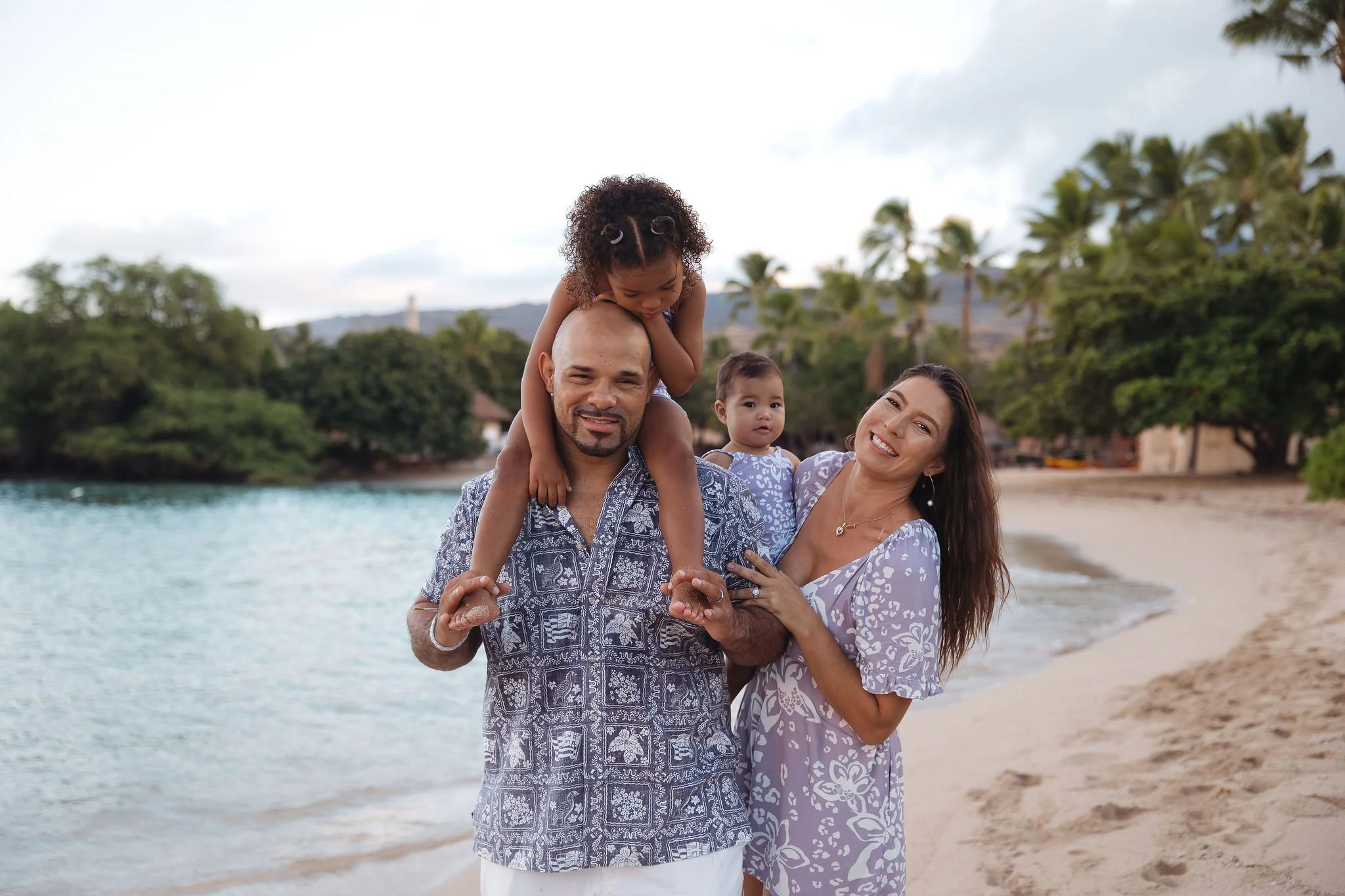 Tina Marie Gamble and her Family on the beach in O'ahu