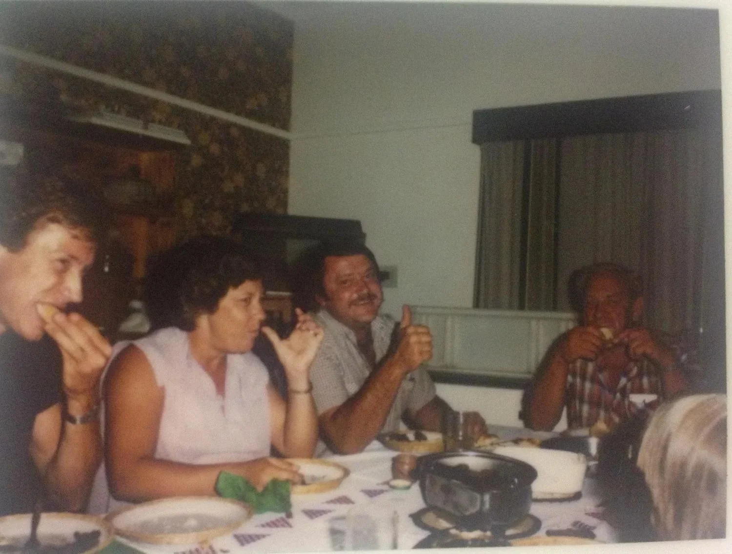 Sunday lunch on the farm, early 1980s: Suzaan's mother, father and uncle around the table