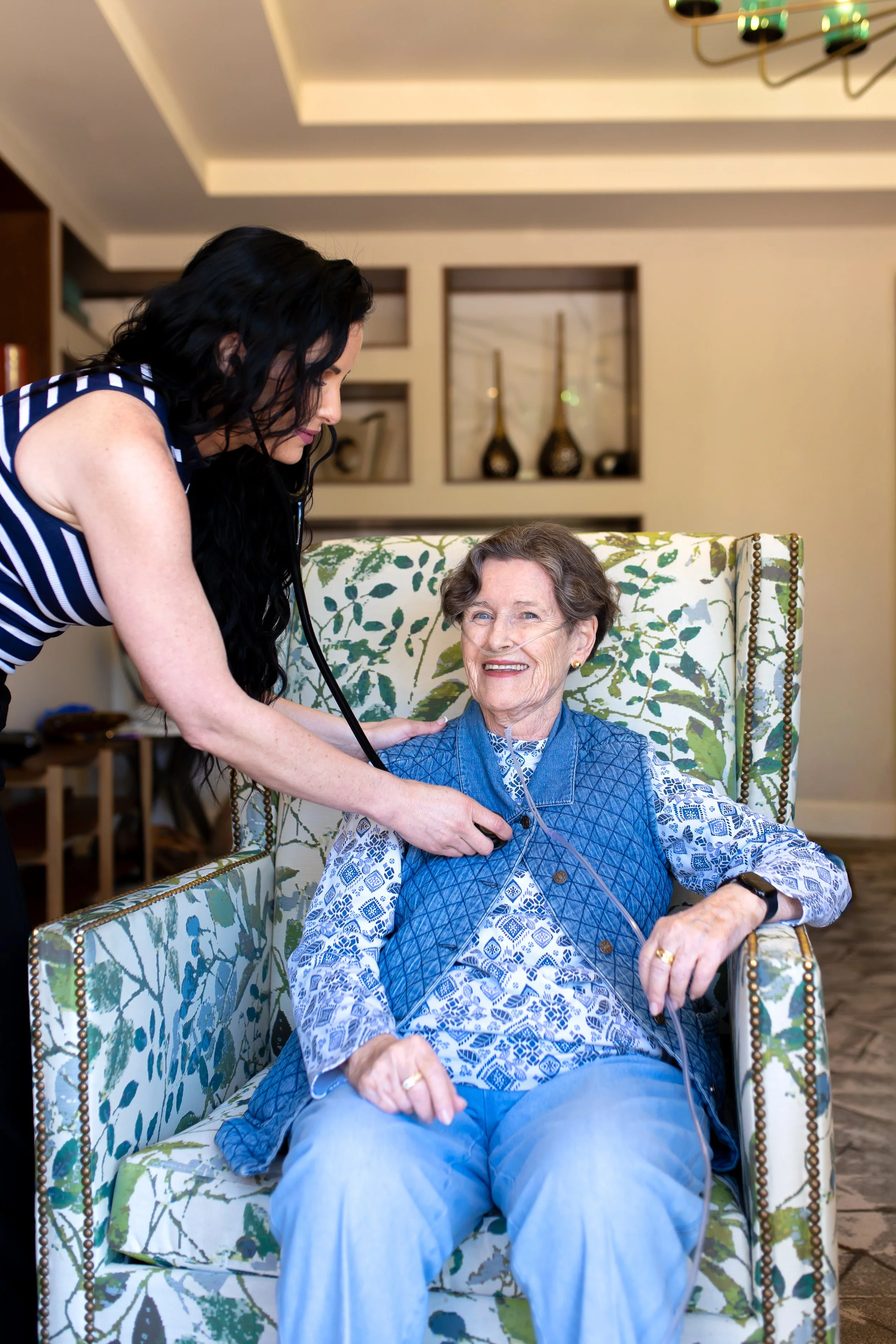 A care professional sharing a calm moment with an older adult
