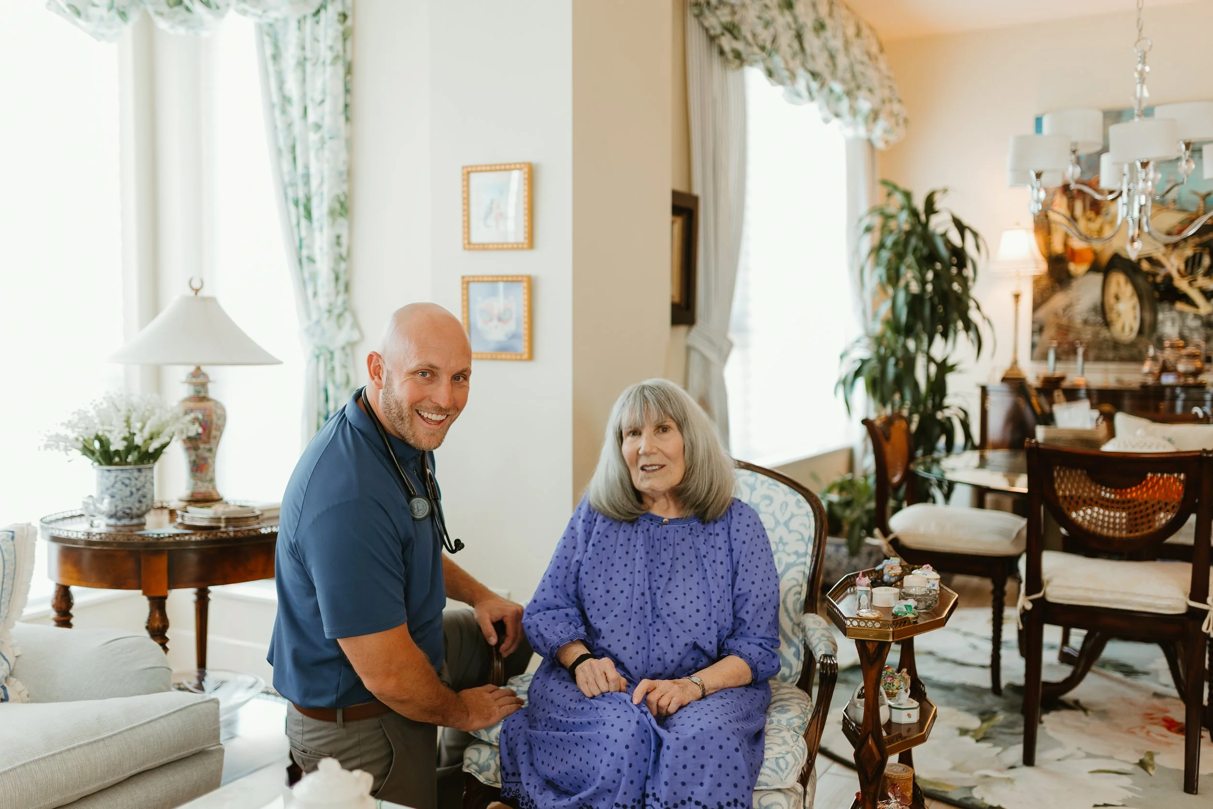 A care professional sharing a calm moment with an older adult
