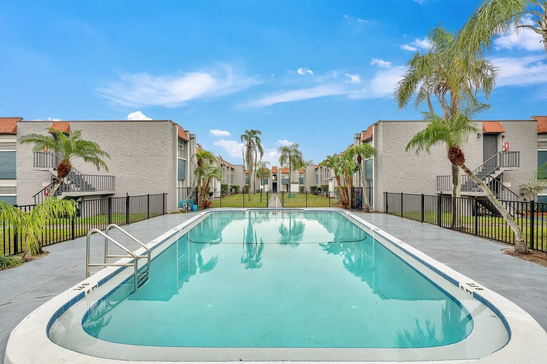 Briar Hill Apartments courtyard pool between two-story buildings