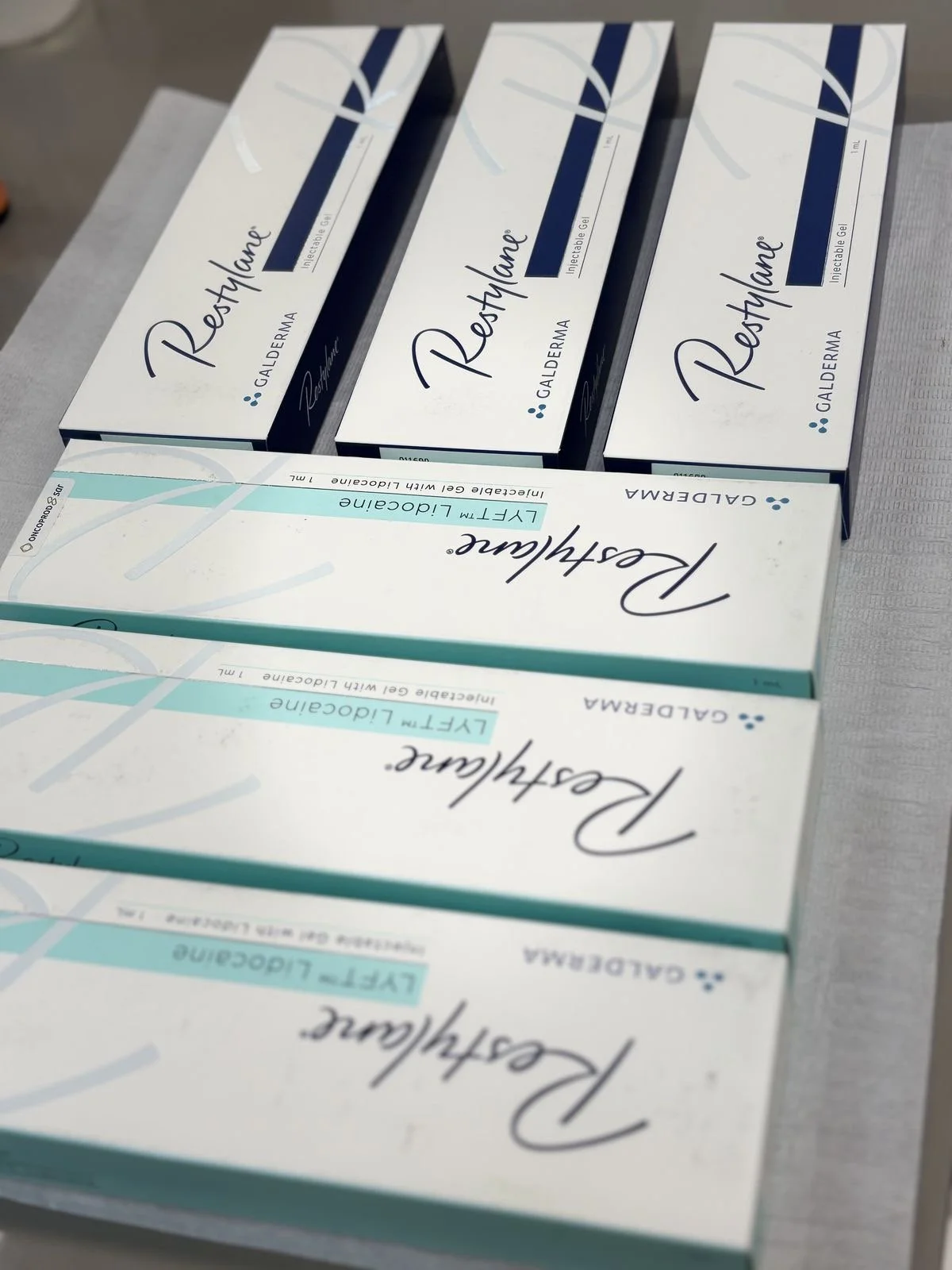 Dermal fillers treatment at EMVEE Medspa Coral Gables — hyaluronic acid facial volume restoration