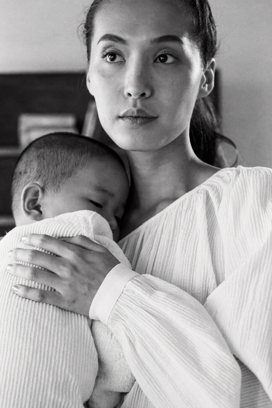 Mother holding her baby