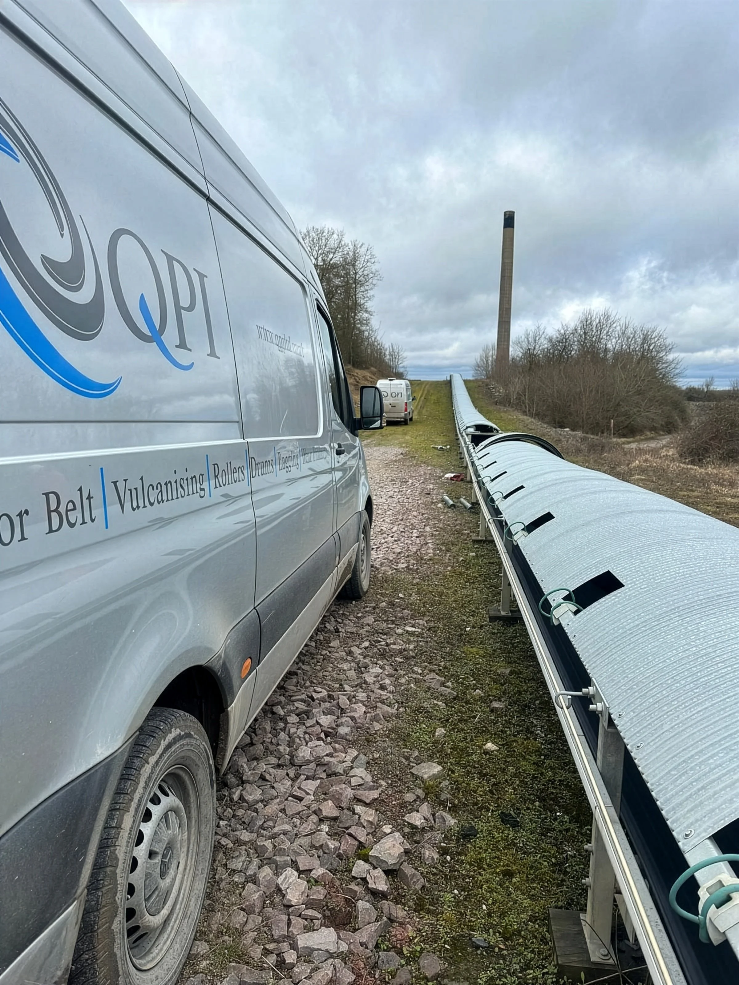 Conveyor cover system protecting outdoor conveyor equipment