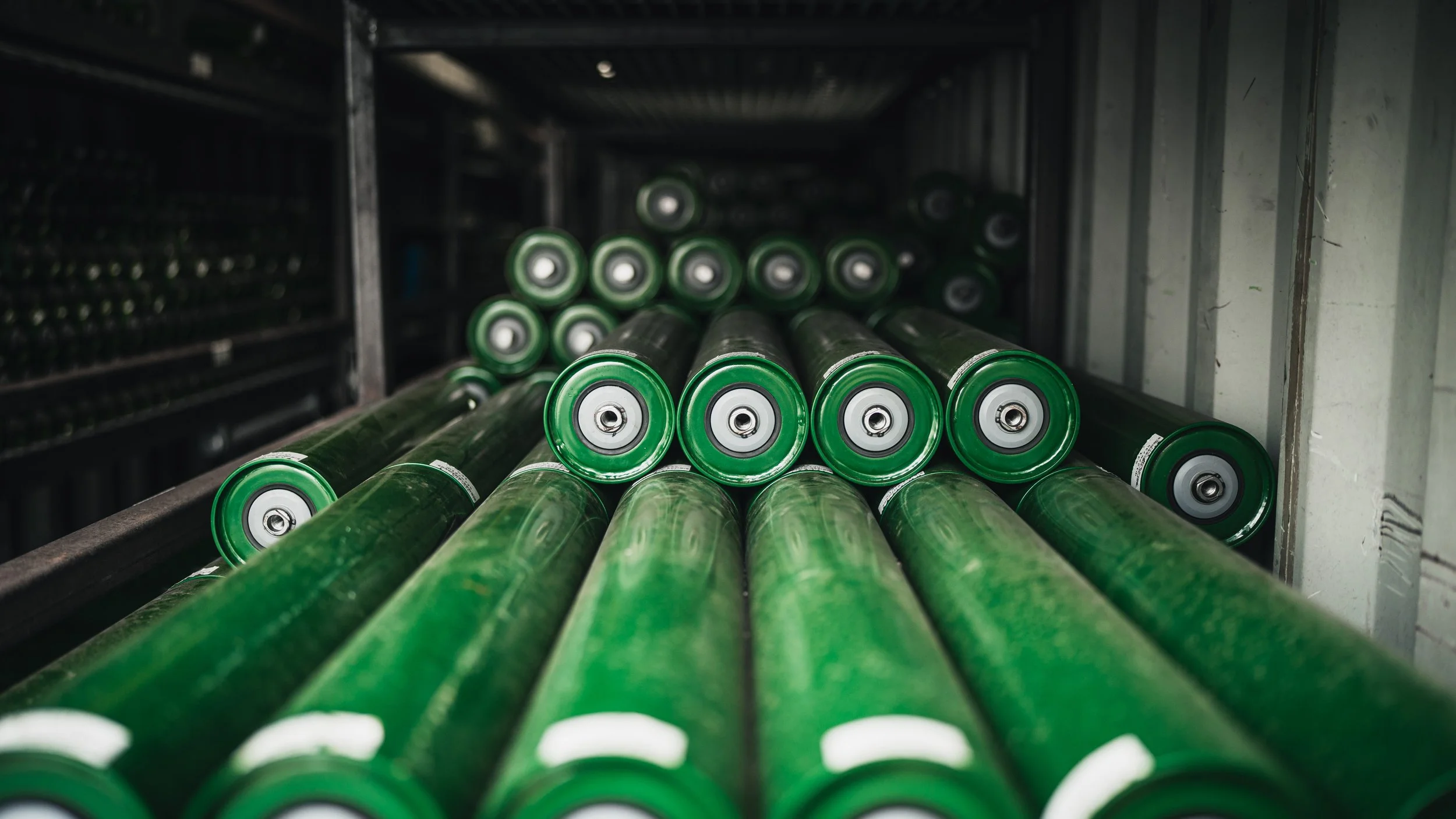 Conveyor roller and frame assembly