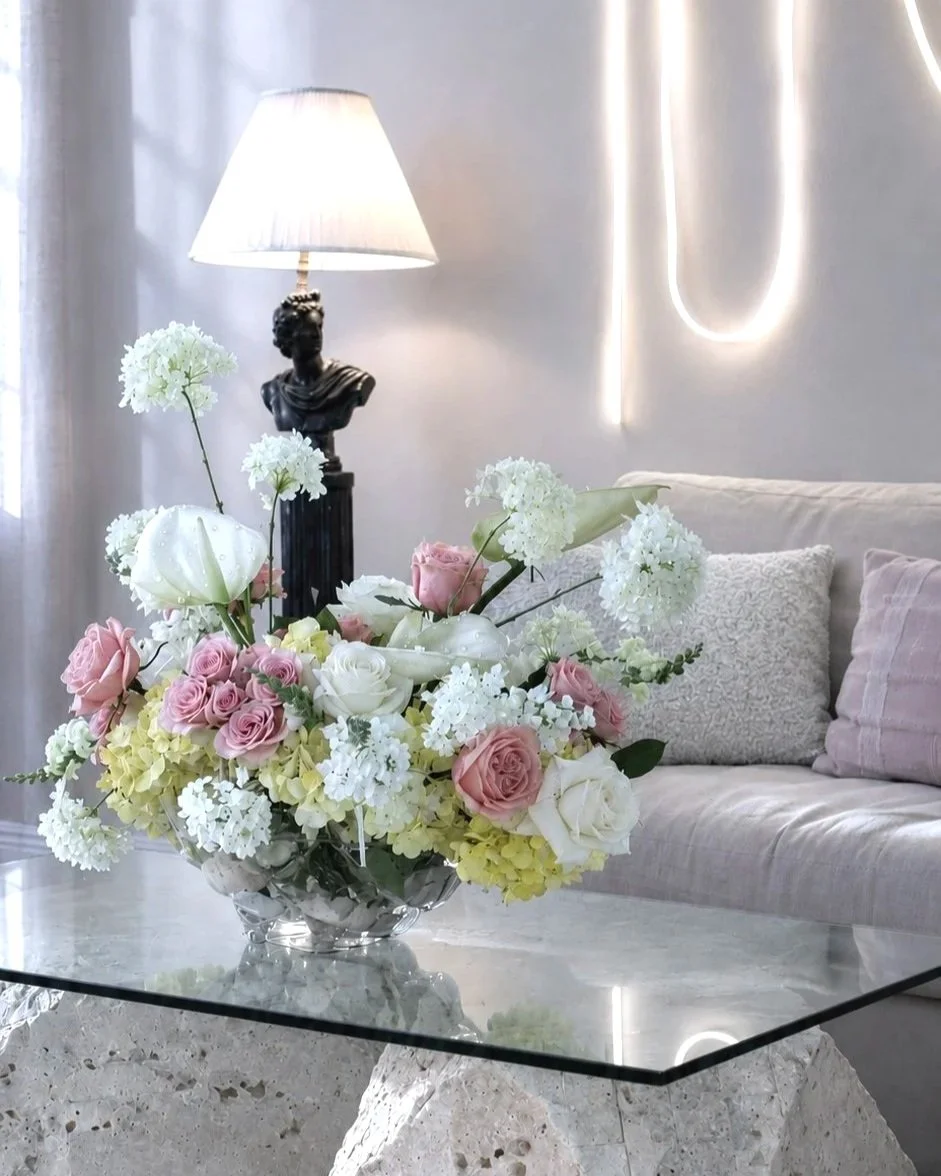 Weekly flower subscription arrangement designed for the living room it sits in, Vero Beach home