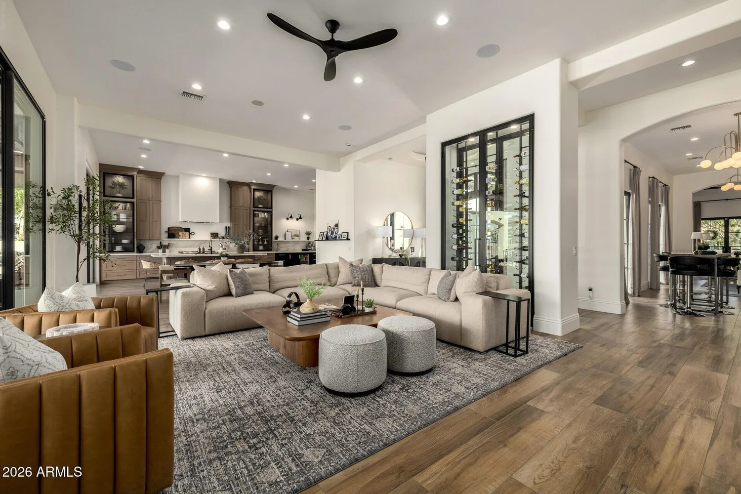 Open great room with a glass wine wall in a South Tempe home