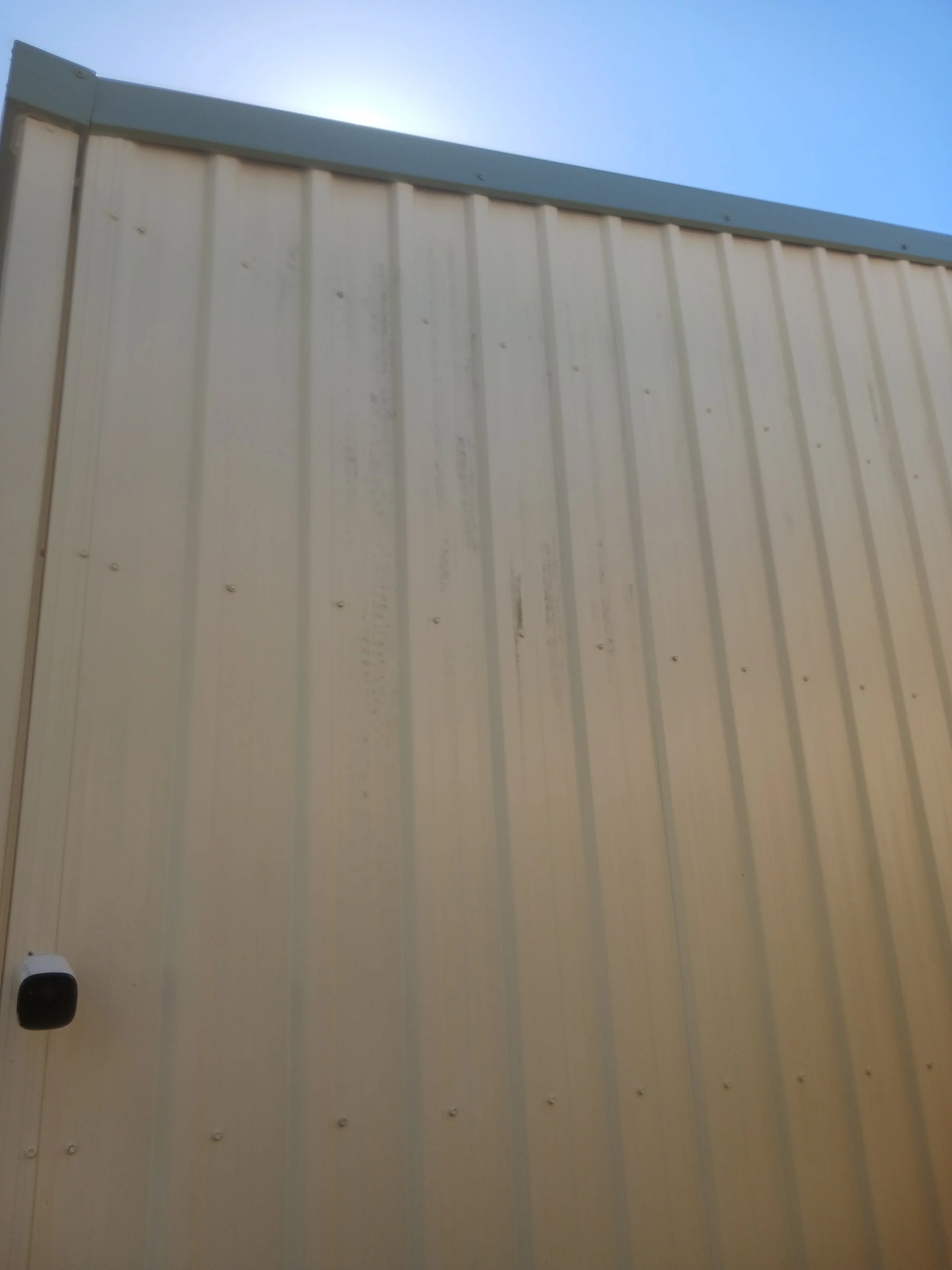 Exterior surface before professional pressure cleaning restoration