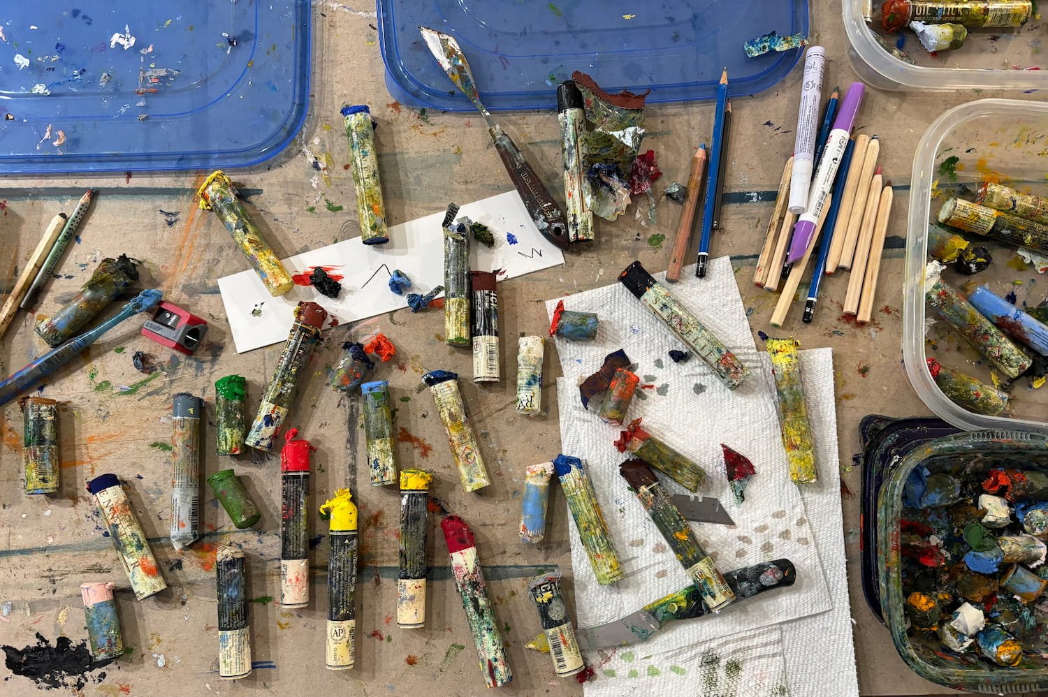 Oil sticks and brown paper in Marcus Bacher's studio