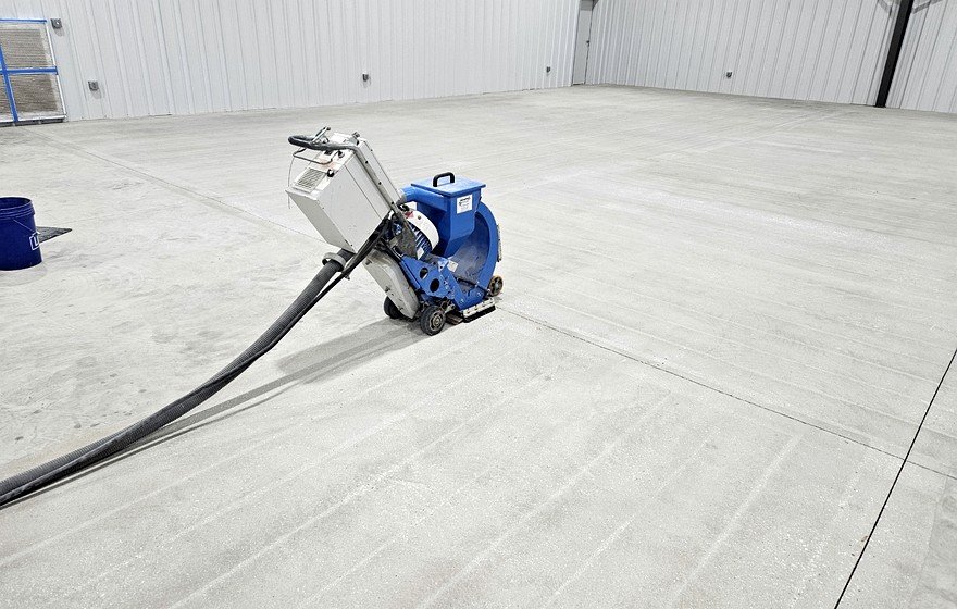 Shot blasting machine preparing concrete surface