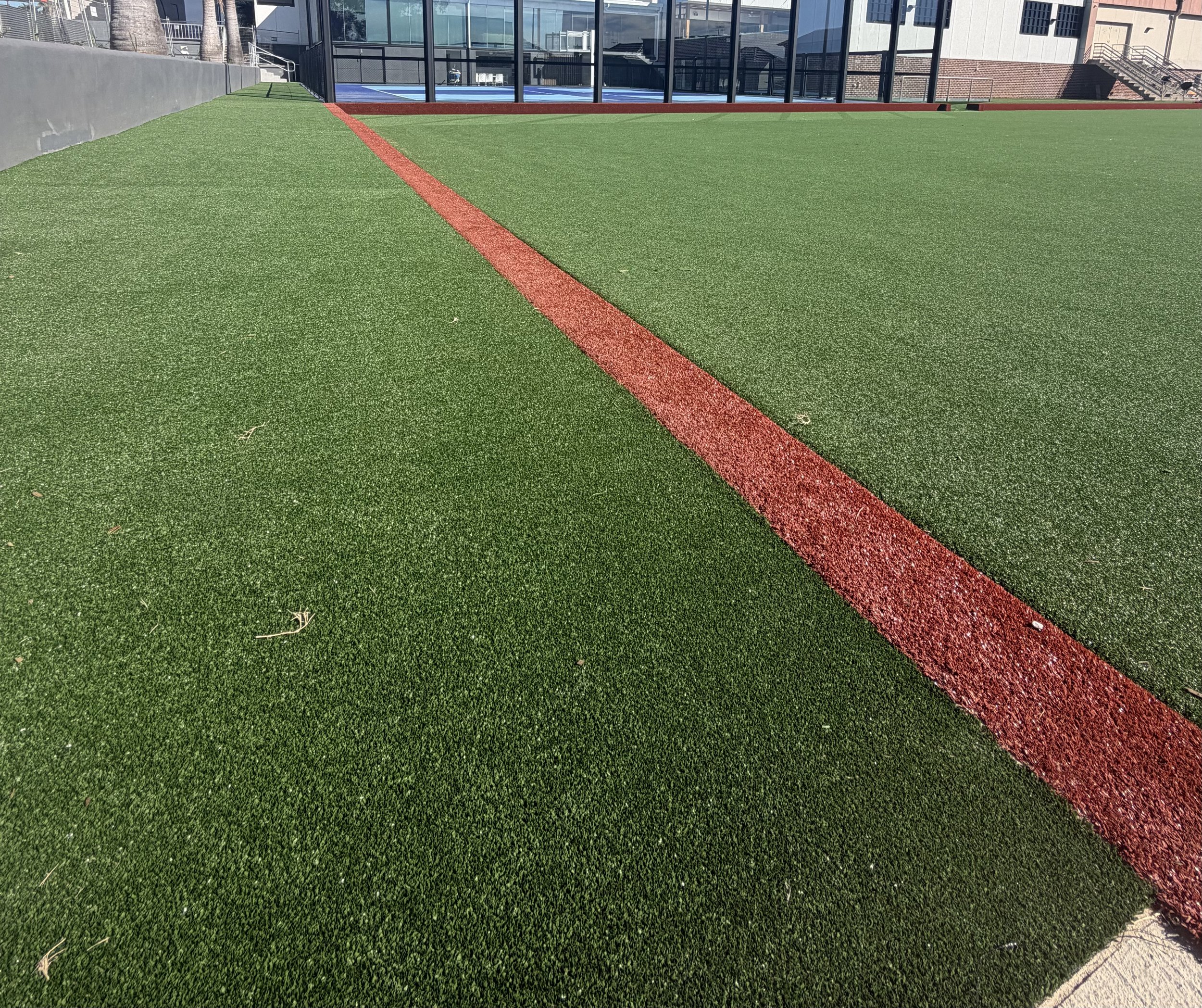 Synthetic grass installation