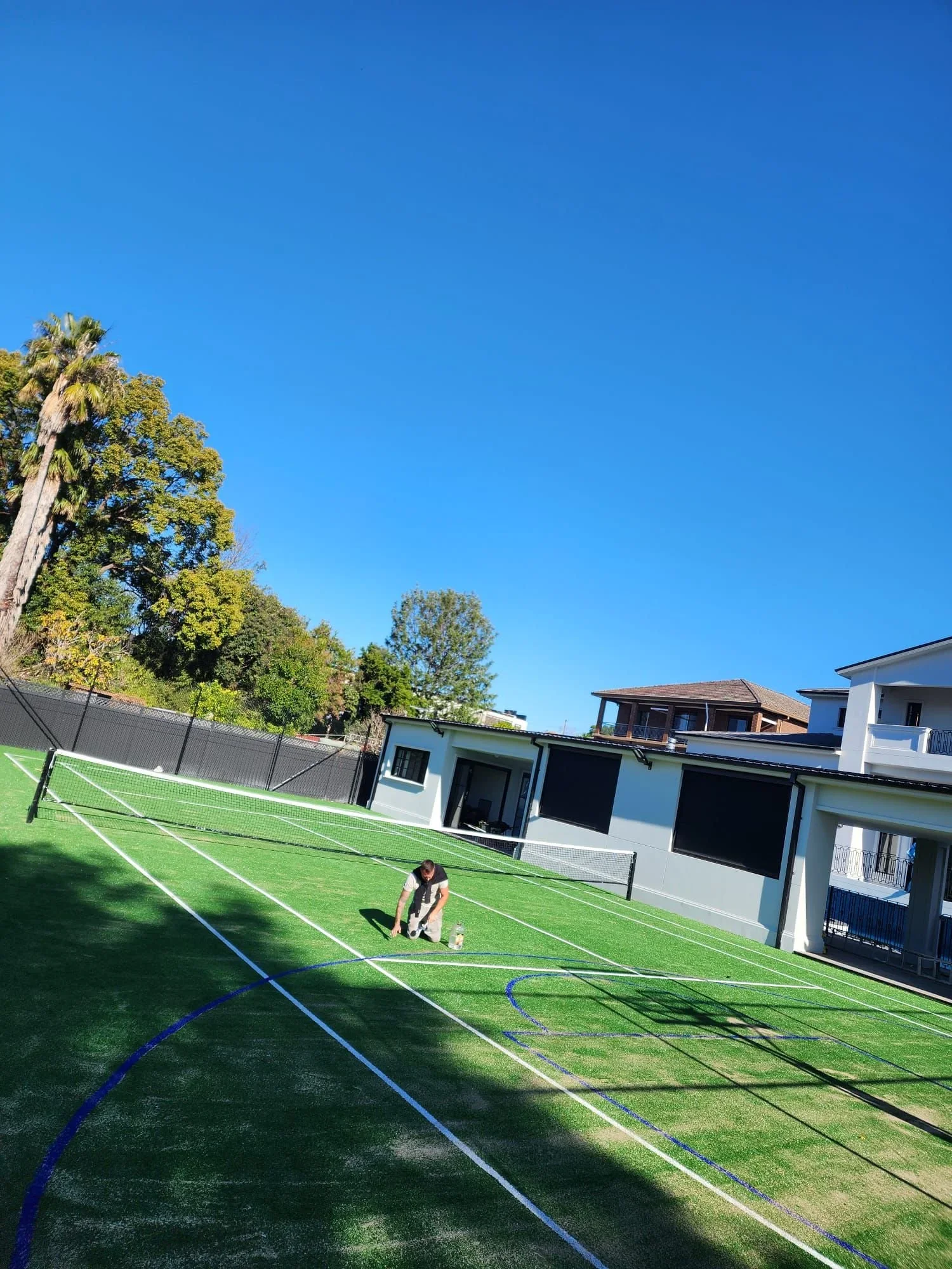 Synthetic grass tennis court