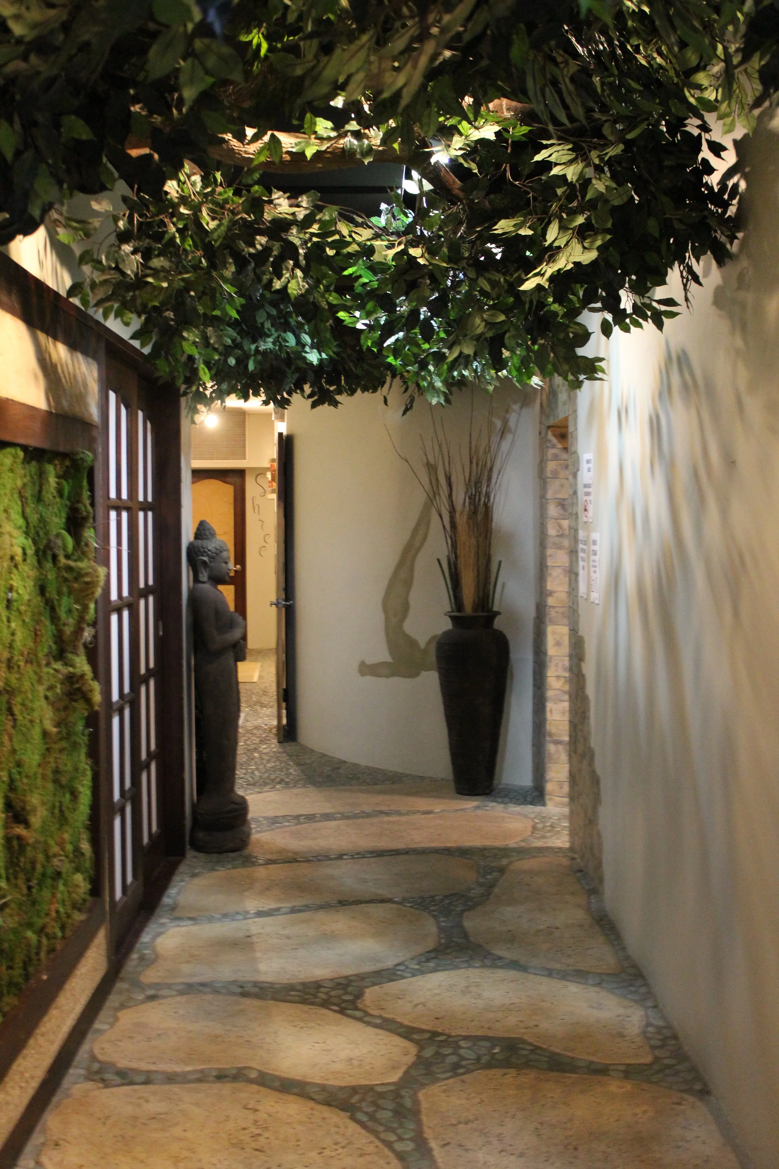 Beautiful hallway and artwork inside Thrive Yoga