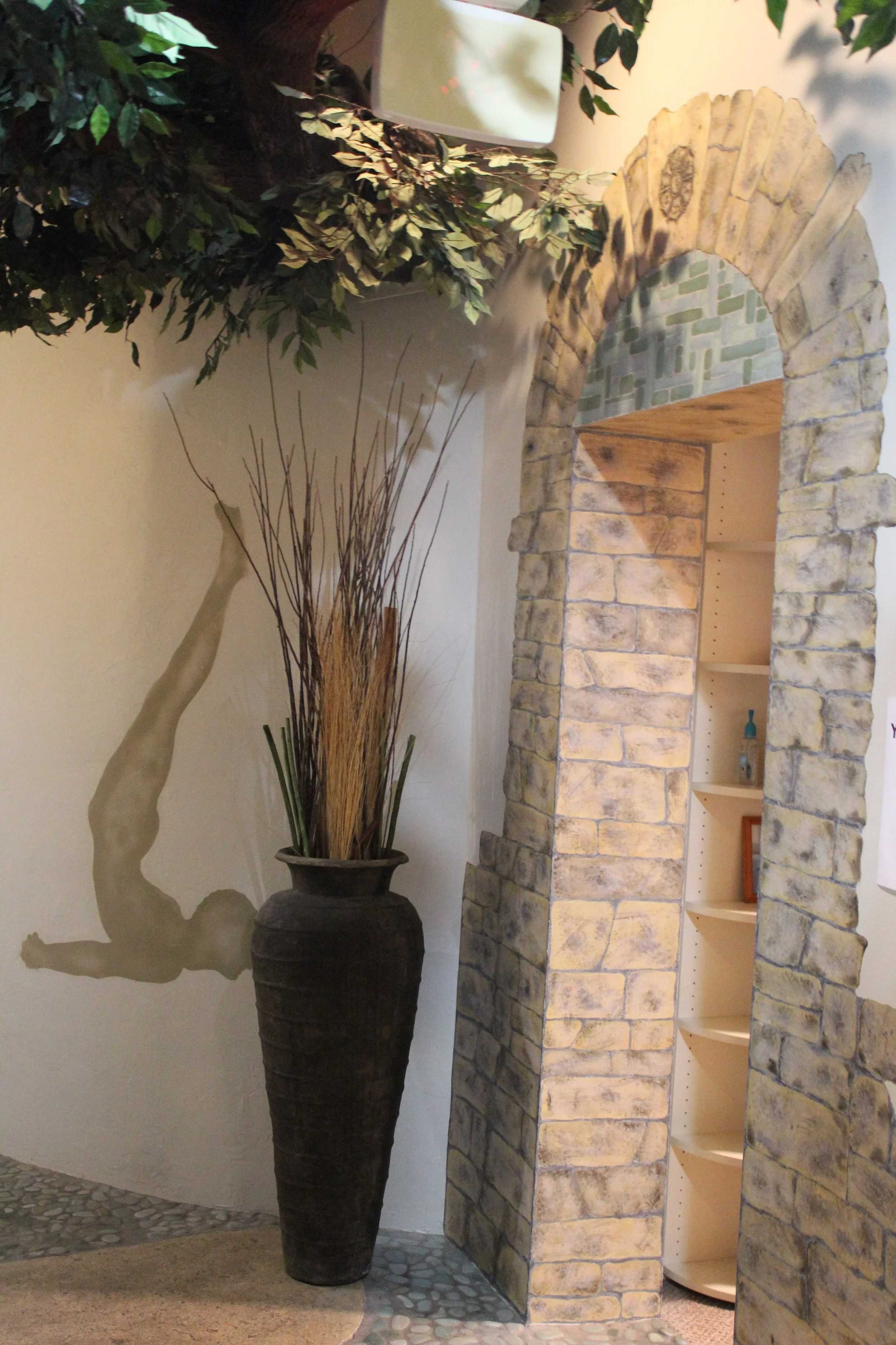 Artwork in the hallway to member storage