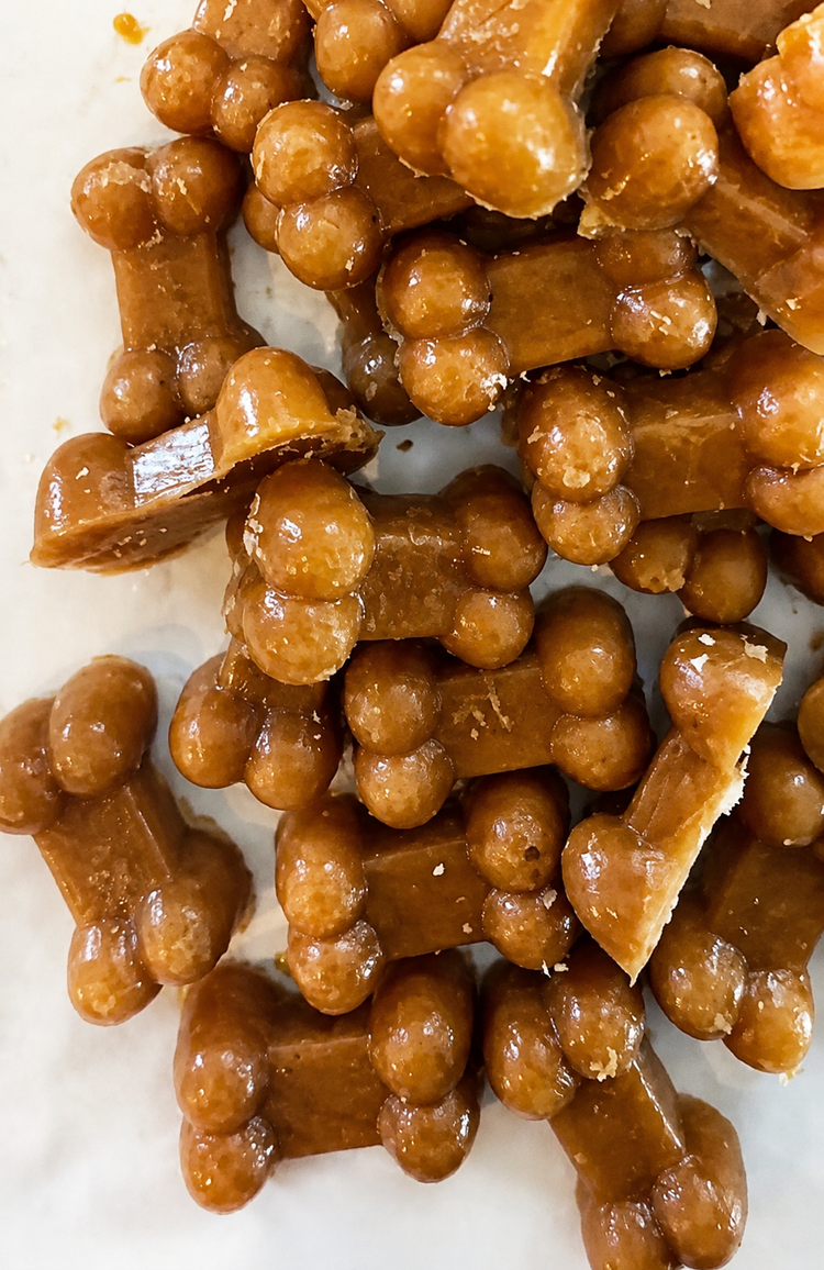 Pumpkin and banana Freezy Pup bone treats on a tray