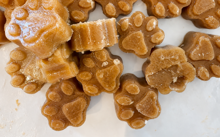 Pumpkin and banana Freezy Pup paw treats on a tray
