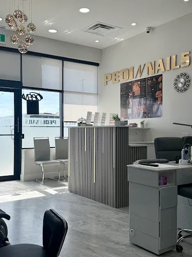 Waiting area and reception at Pedi N Nails Mapleview West in Barrie