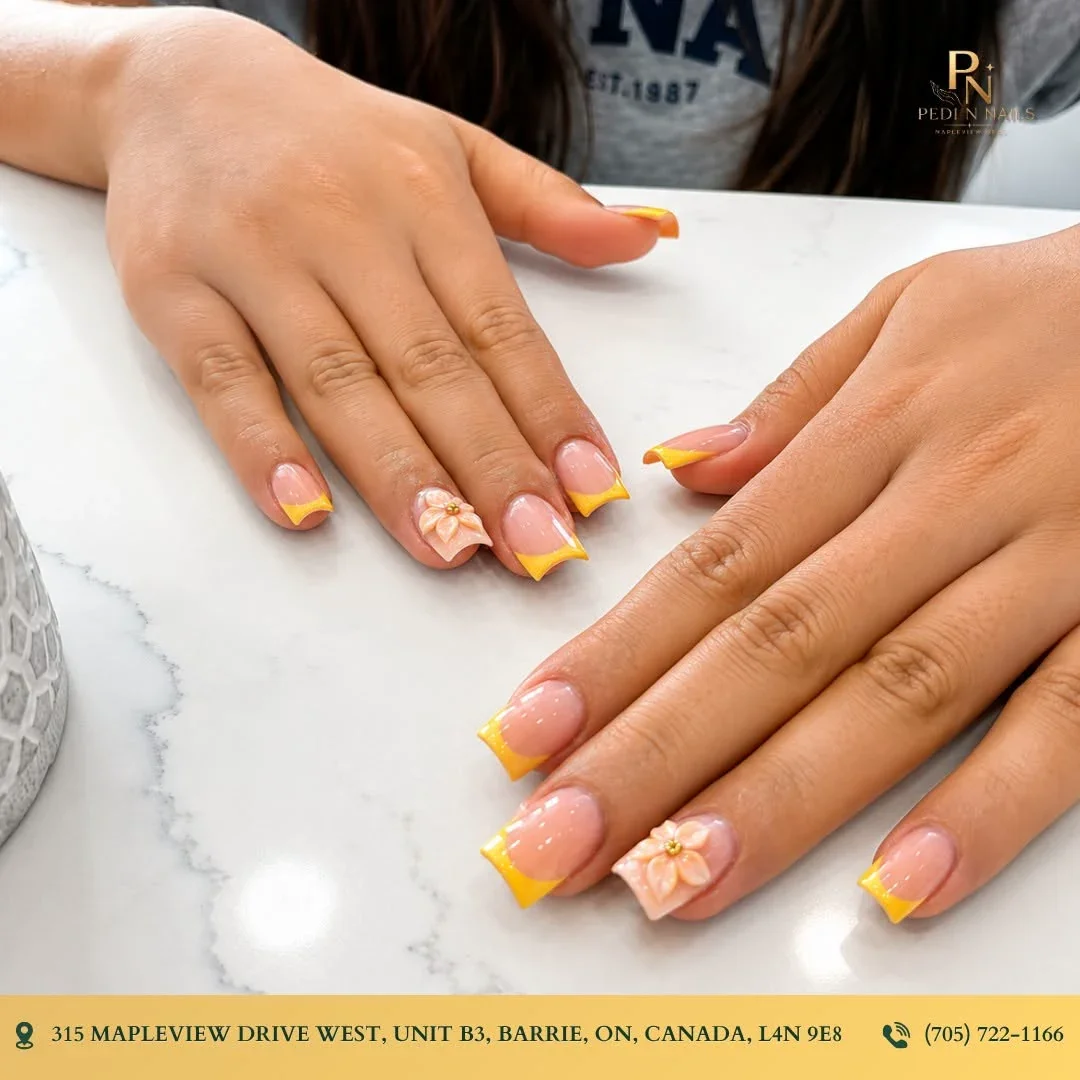 Yellow French manicure with floral nail art created at Pedi N Nails Mapleview West