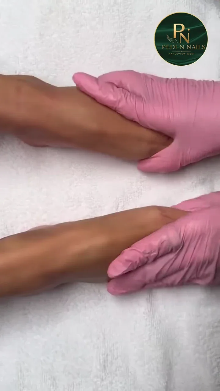 Gloved hands providing a comfortable salon treatment at Pedi N Nails Mapleview West