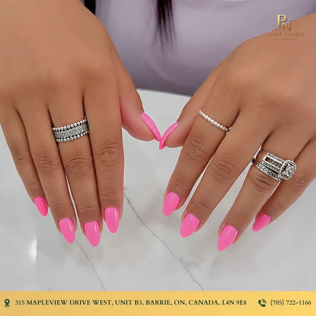 Hot pink acrylic nail set created at Pedi N Nails Mapleview West in Barrie