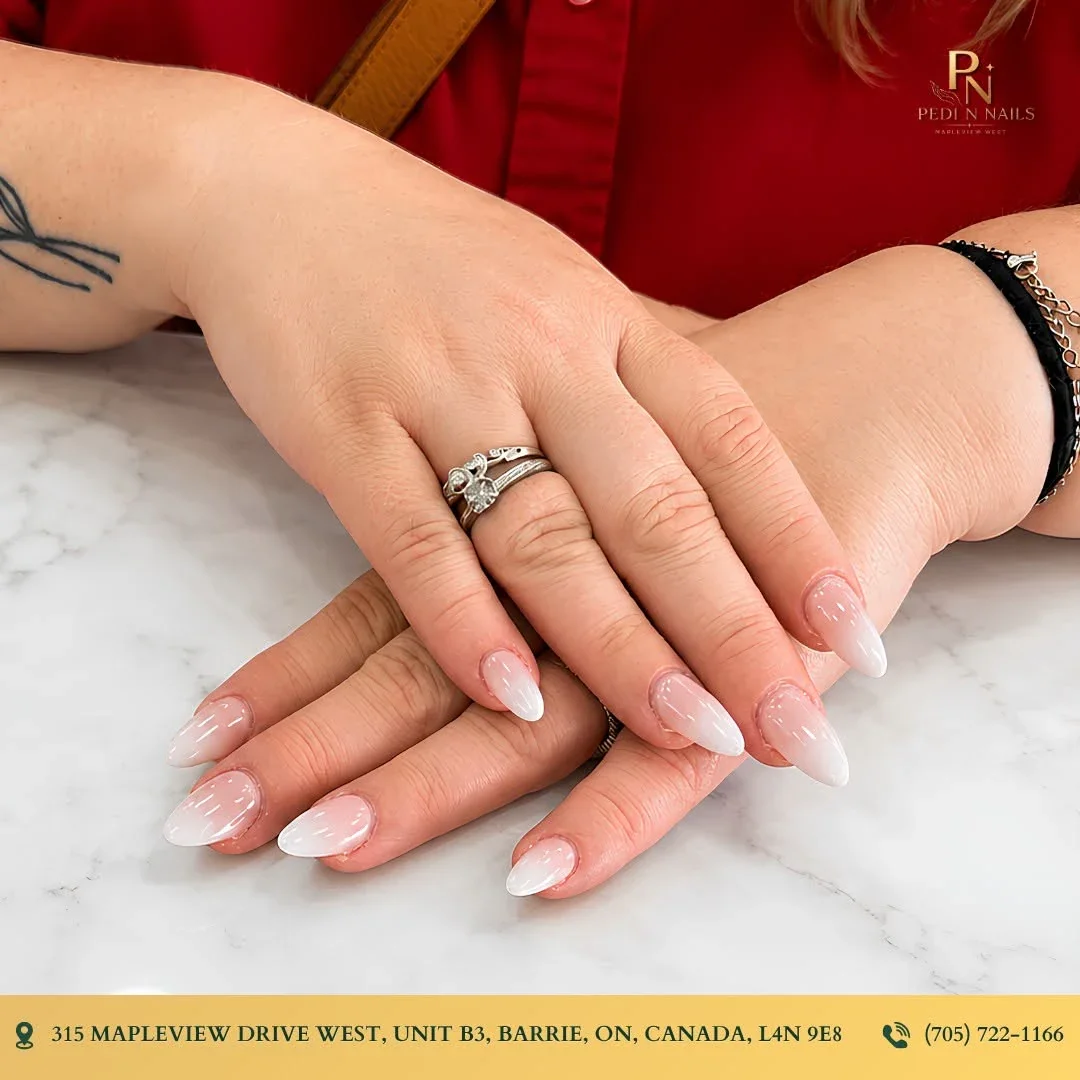 Short natural nails with a soft glitter overlay at Pedi N Nails Mapleview West