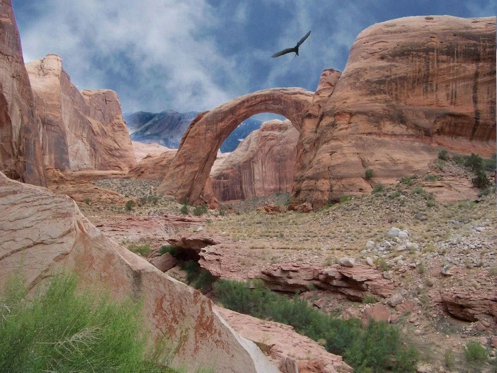 Rainbow Bridge, a sandstone arch above a side canyon