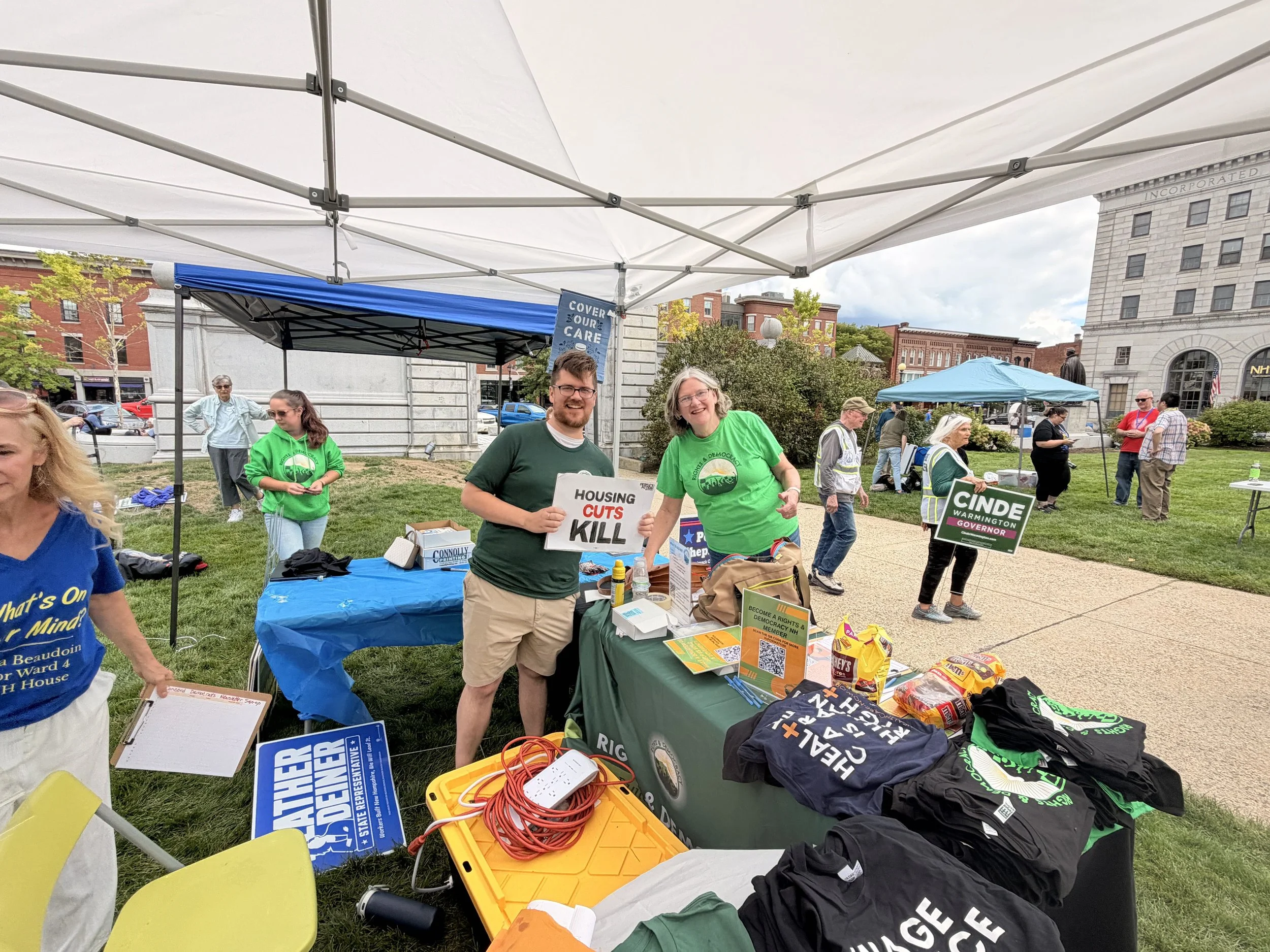 RAD-NH outreach table at an outdoor community gathering.