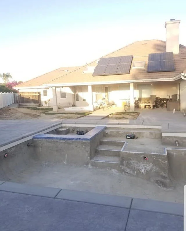 Custom masonry block work under construction by Specialty Landscape