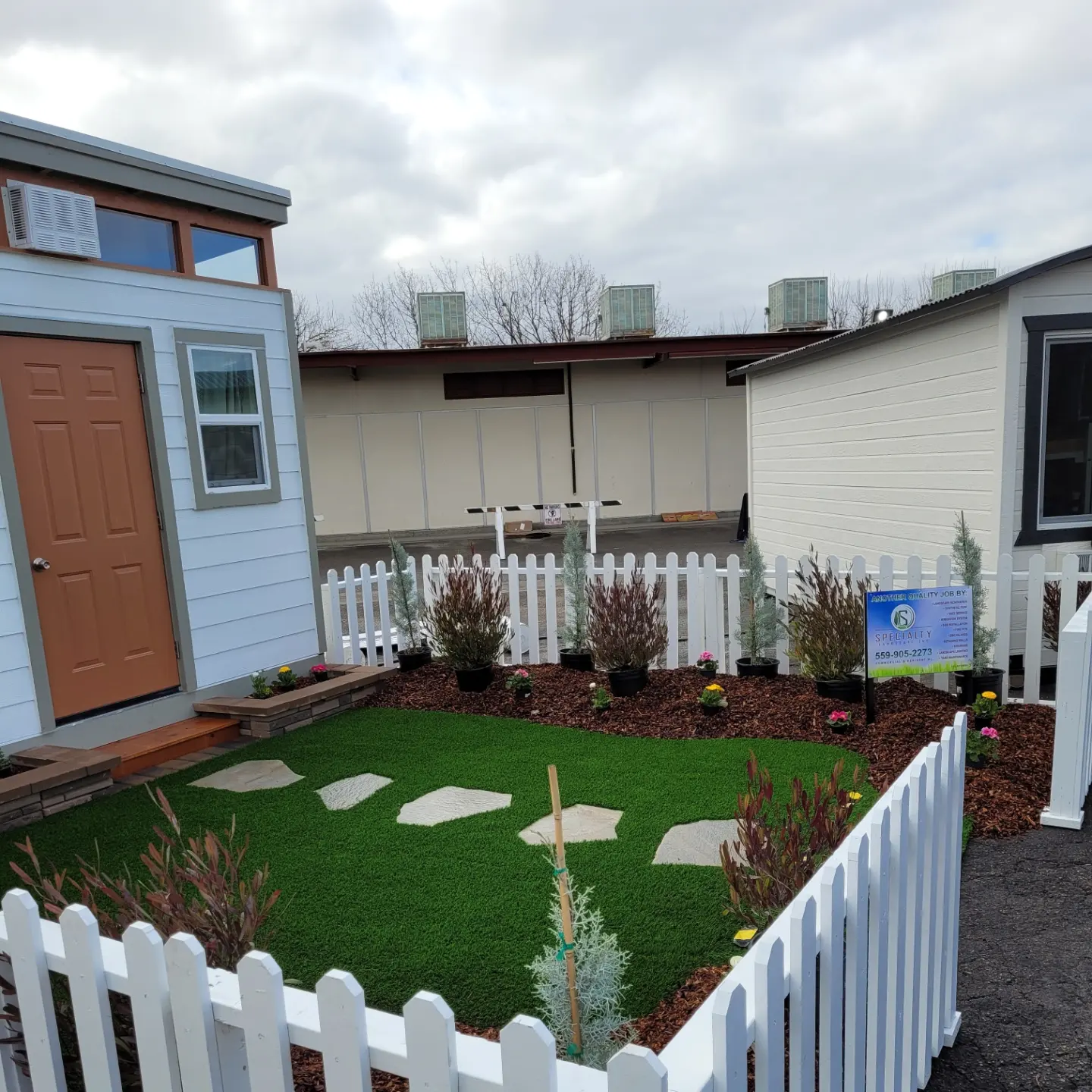 Front yard beds and lawn from a custom landscape design by Specialty Landscape