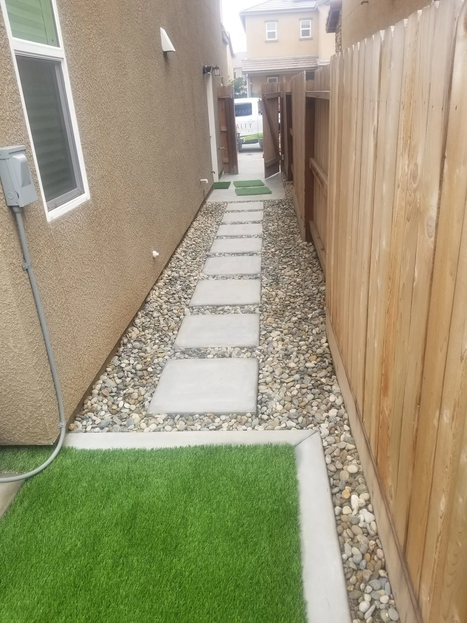 Stepping stones set in decomposed granite and gravel for a pathway by Specialty Landscape