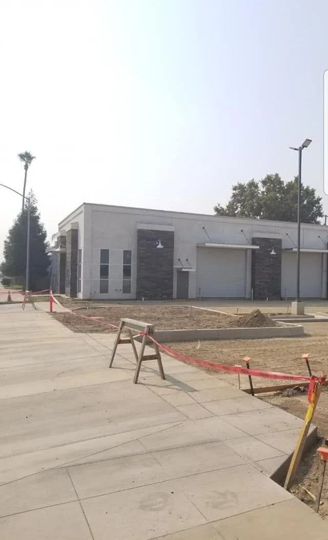 Concrete forms set during site preparation at a commercial build by Specialty Landscape